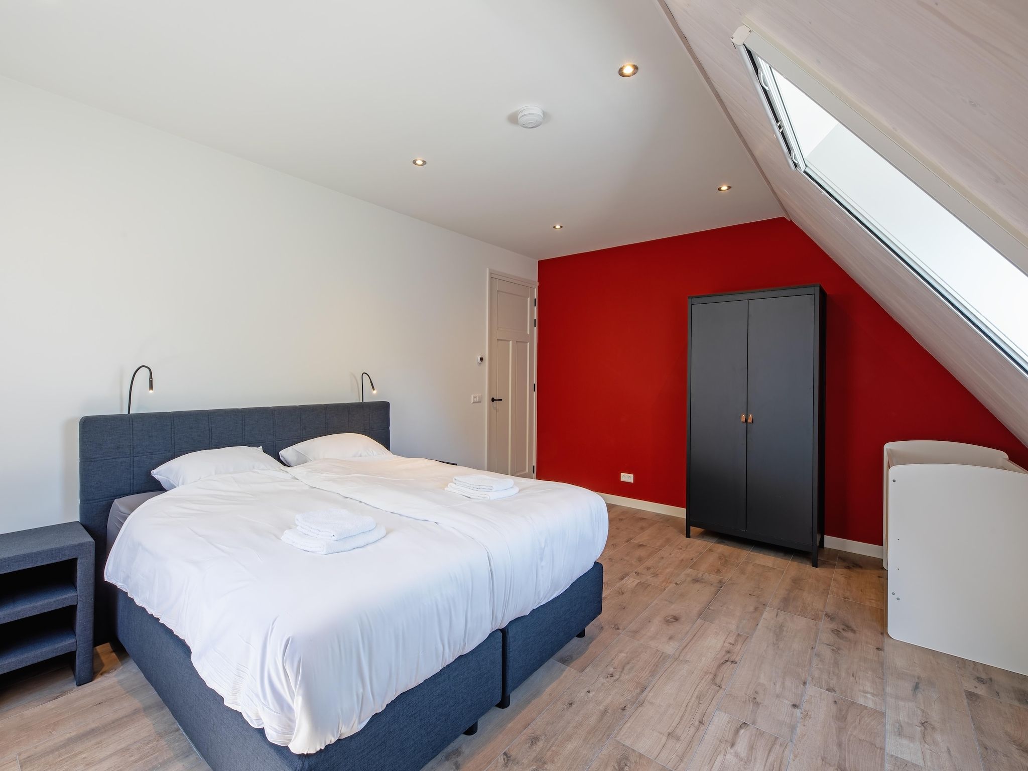 Een slaapkamer van Familievilla Nieuw-Zeeland in Oosterend