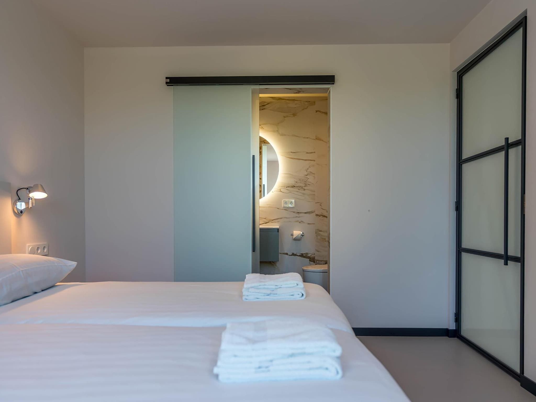 Een slaapkamer van ’t Waddenstrandje in Oudeschild