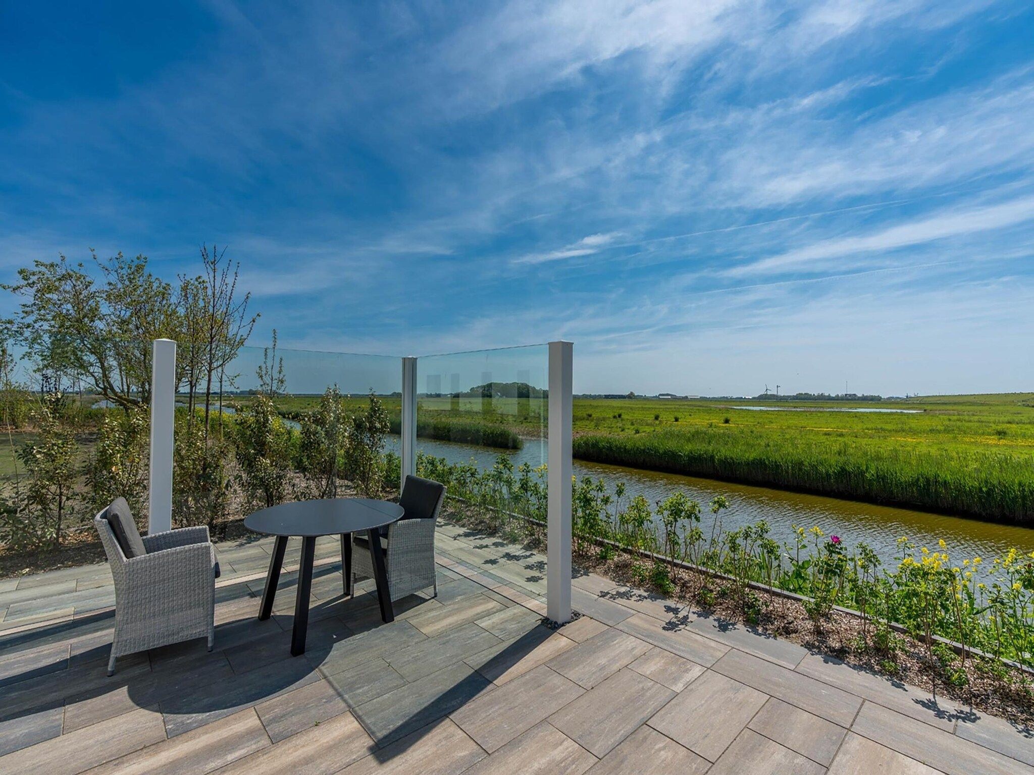 Het uitzicht vanaf ’t Waddenstrandje in Oudeschild