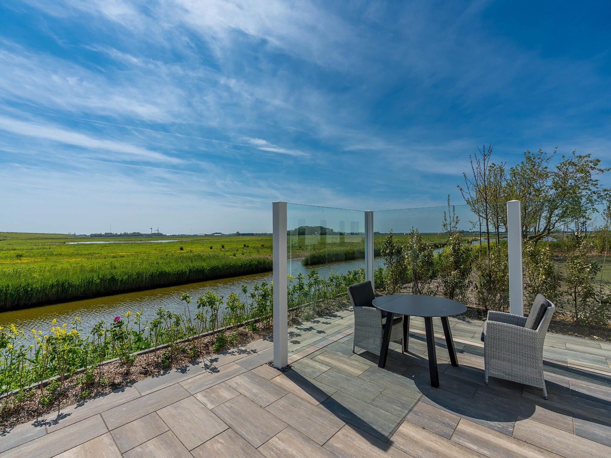 Het uitzicht vanaf ’t Waddenstrandje in Oudeschild