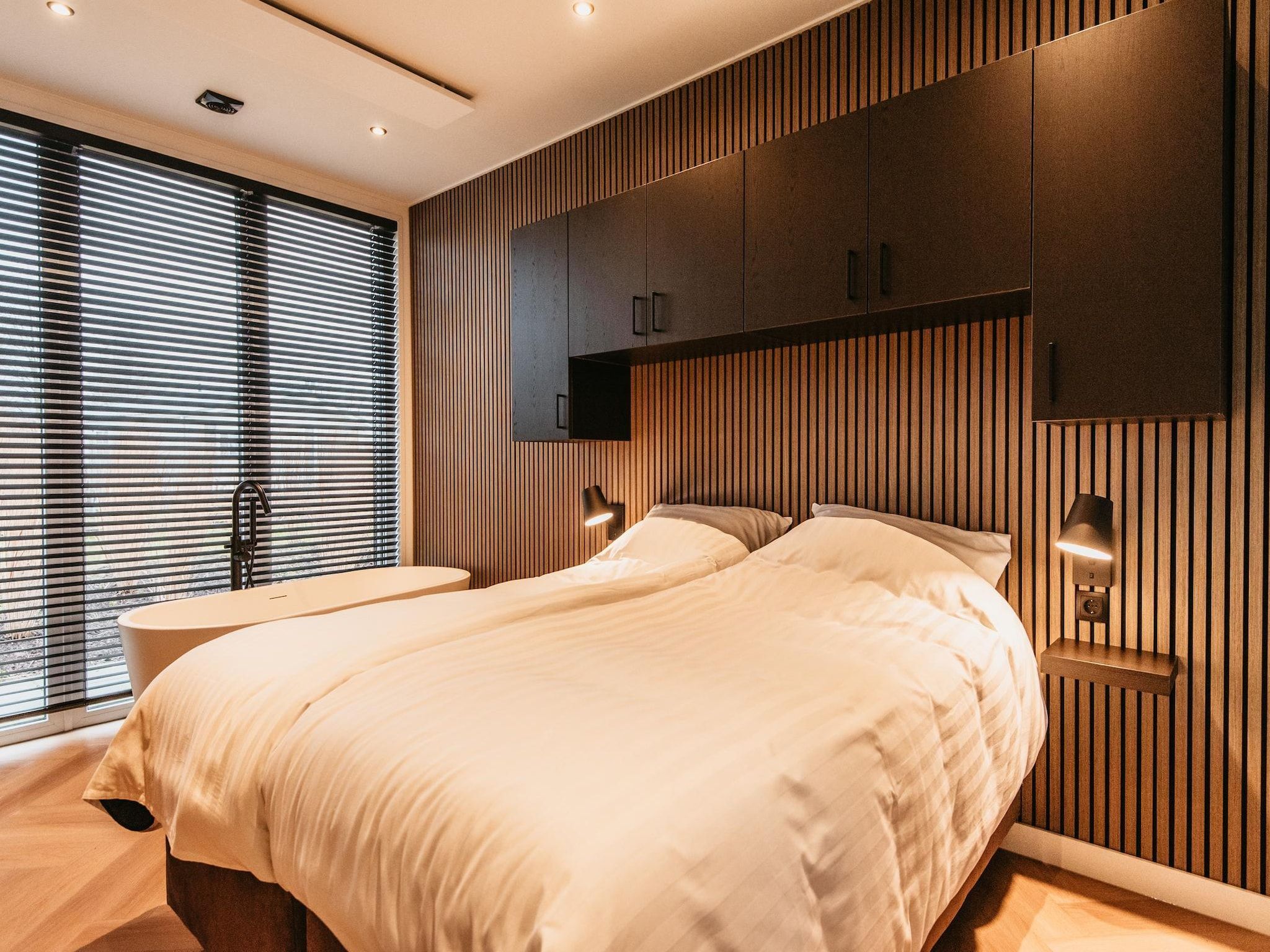 Een slaapkamer van Chalet aan het Water - Betuwse Hofjes - 4P in Kesteren