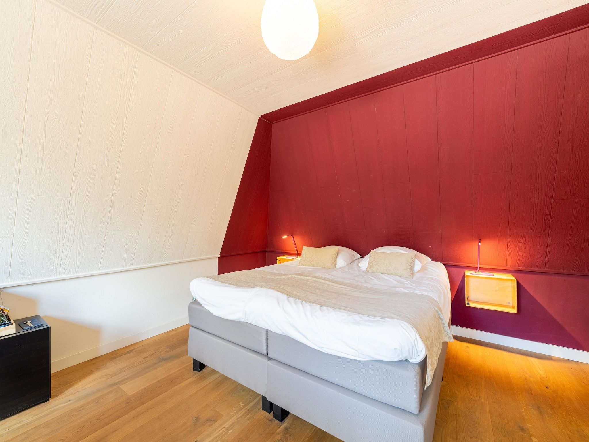 Een slaapkamer van Landhuis Hezenes in Diever