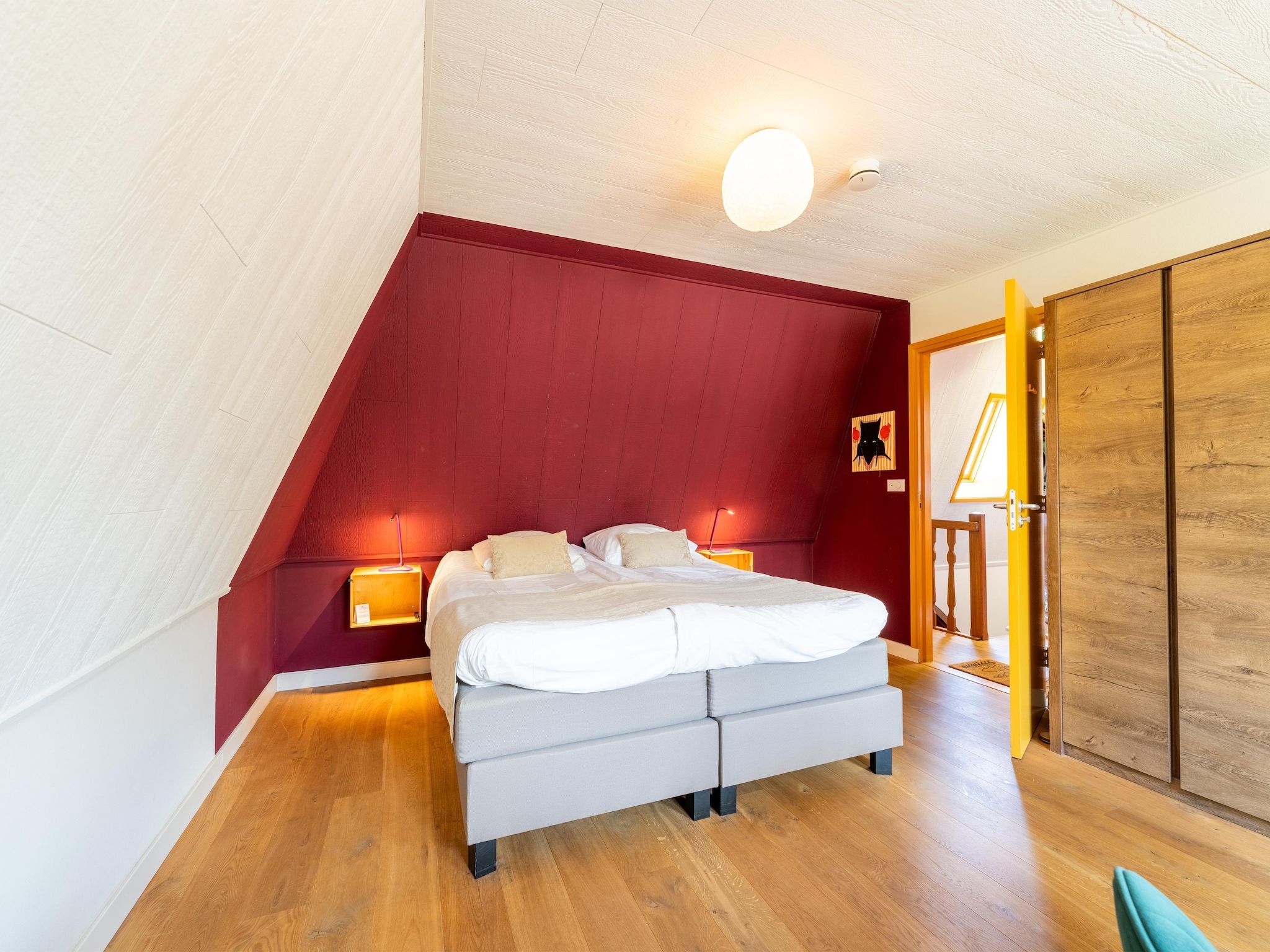 Een slaapkamer van Landhuis Hezenes in Diever