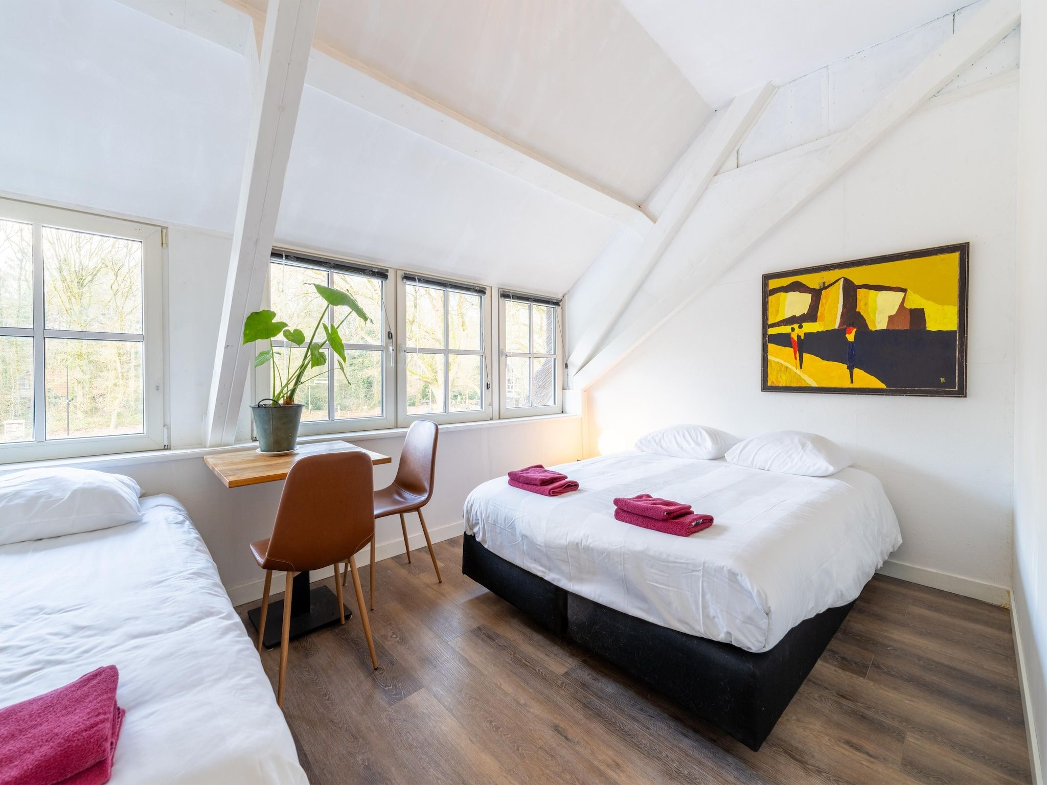 Een slaapkamer van Landhuis Hezenes in Diever