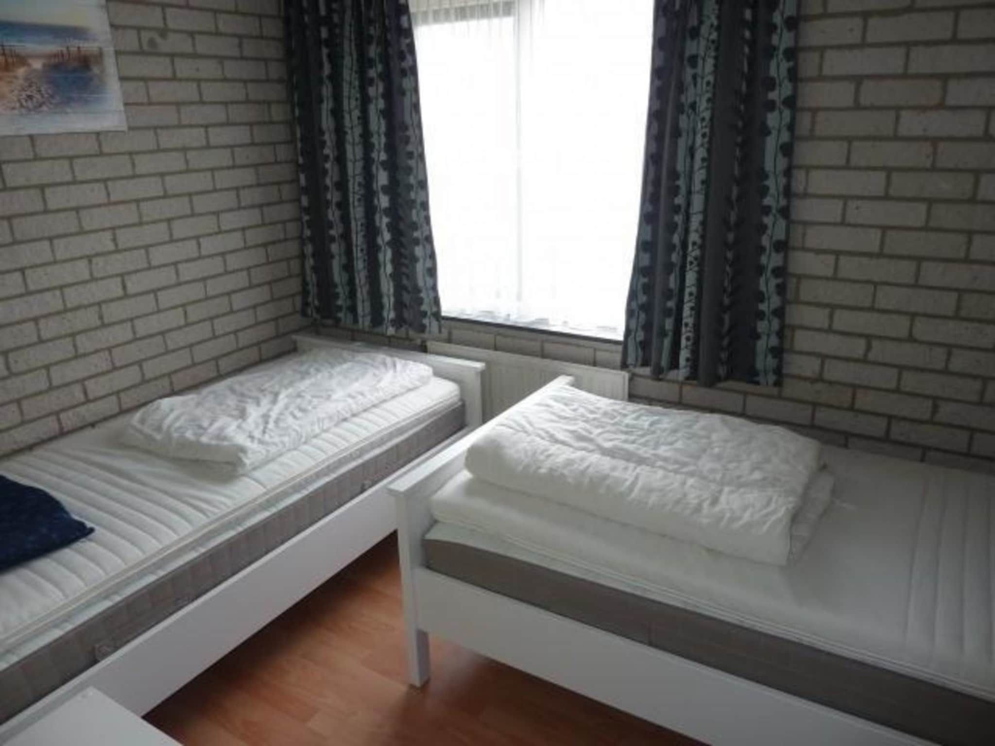 Een slaapkamer van Schoneveld 367 Strandparel Breskens in Breskens