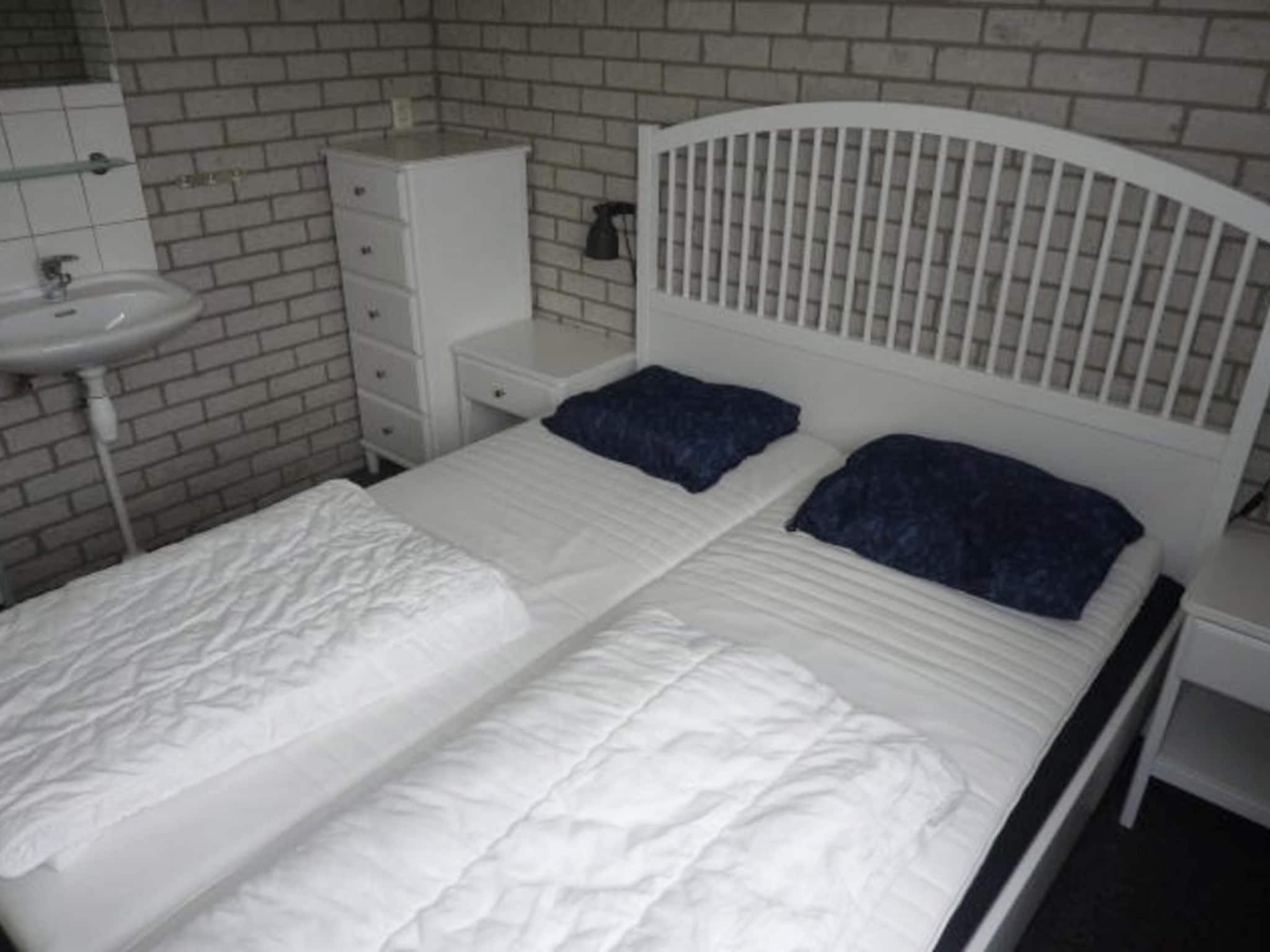 Een slaapkamer van Schoneveld 367 Strandparel Breskens in Breskens