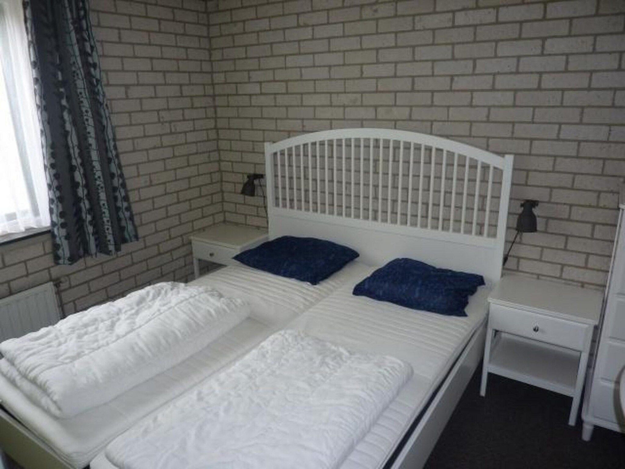 Een slaapkamer van Schoneveld 367 Strandparel Breskens in Breskens