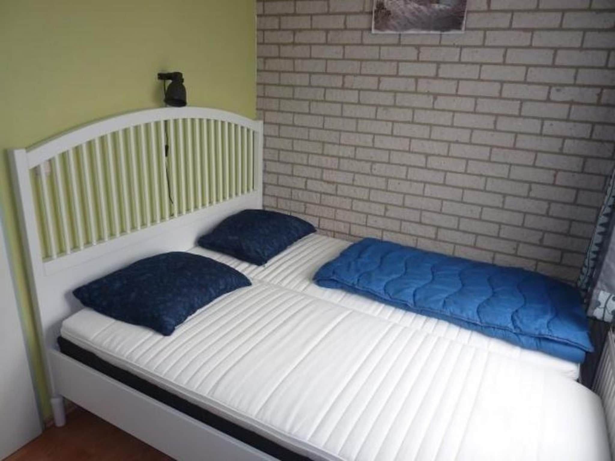 Een slaapkamer van Schoneveld 367 Strandparel Breskens in Breskens