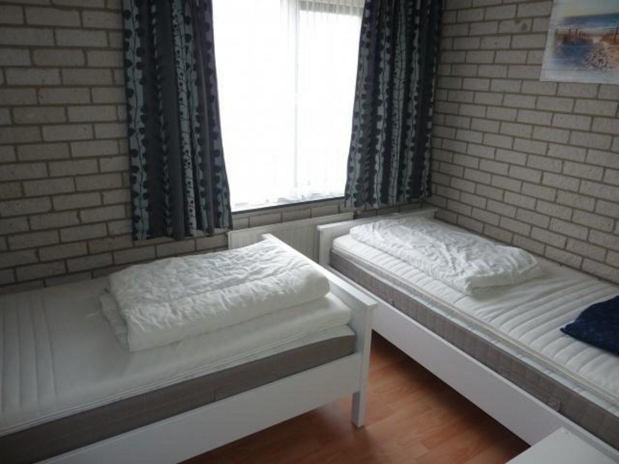 Een slaapkamer van Schoneveld 367 Strandparel Breskens in Breskens