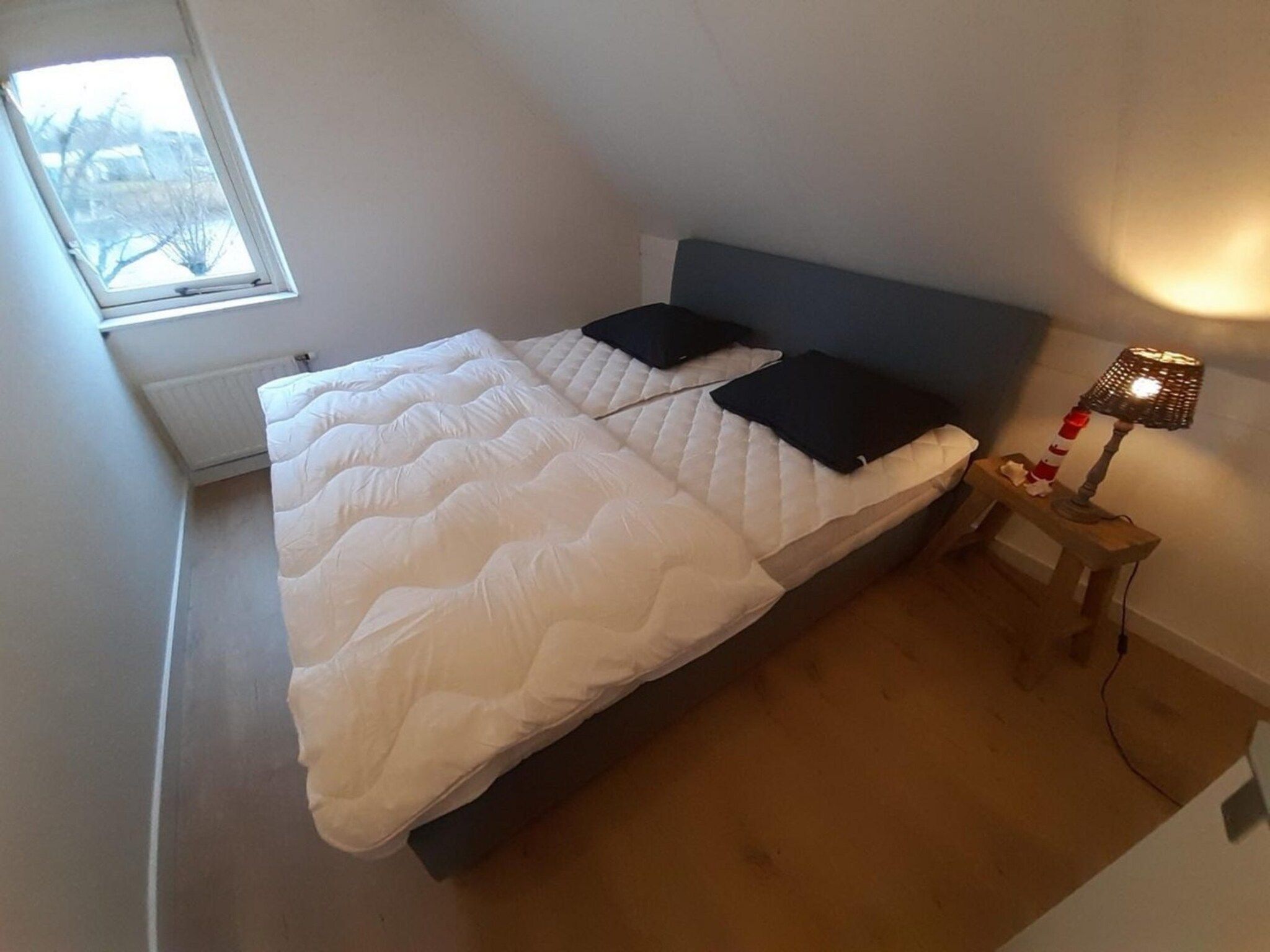 Een slaapkamer van Scheldeveste 33 Zwin Breskens in Breskens