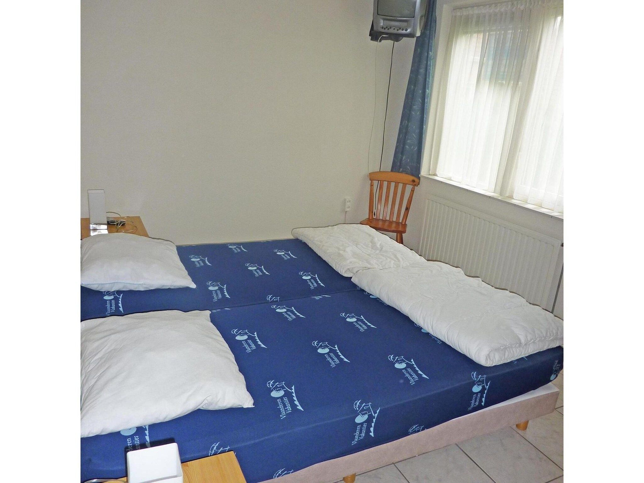 Een slaapkamer van Scheldeveste 97 Schelde Breskens in Breskens