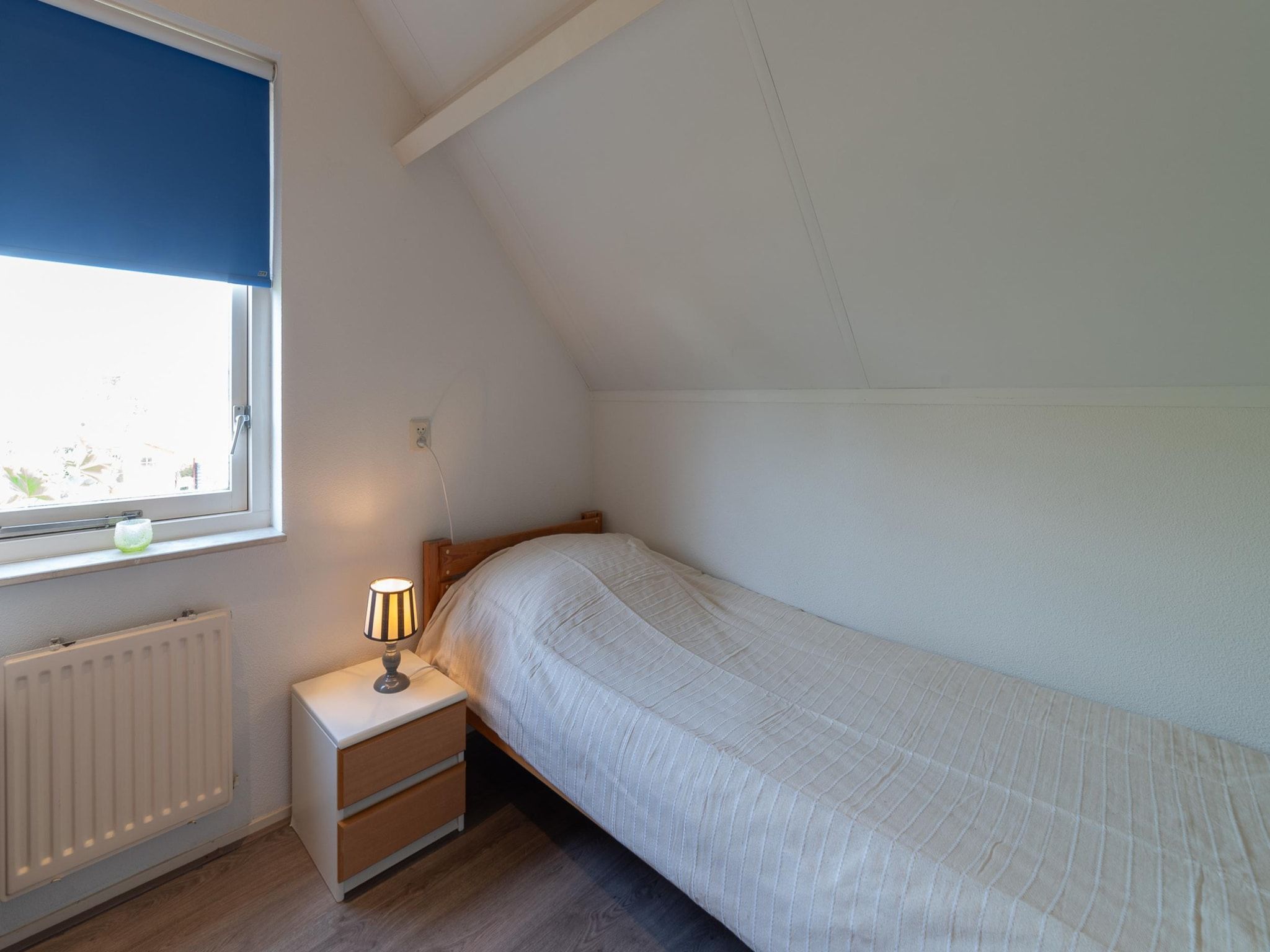 Een slaapkamer van Villapark De Oesterbaai 26 in Wemeldinge