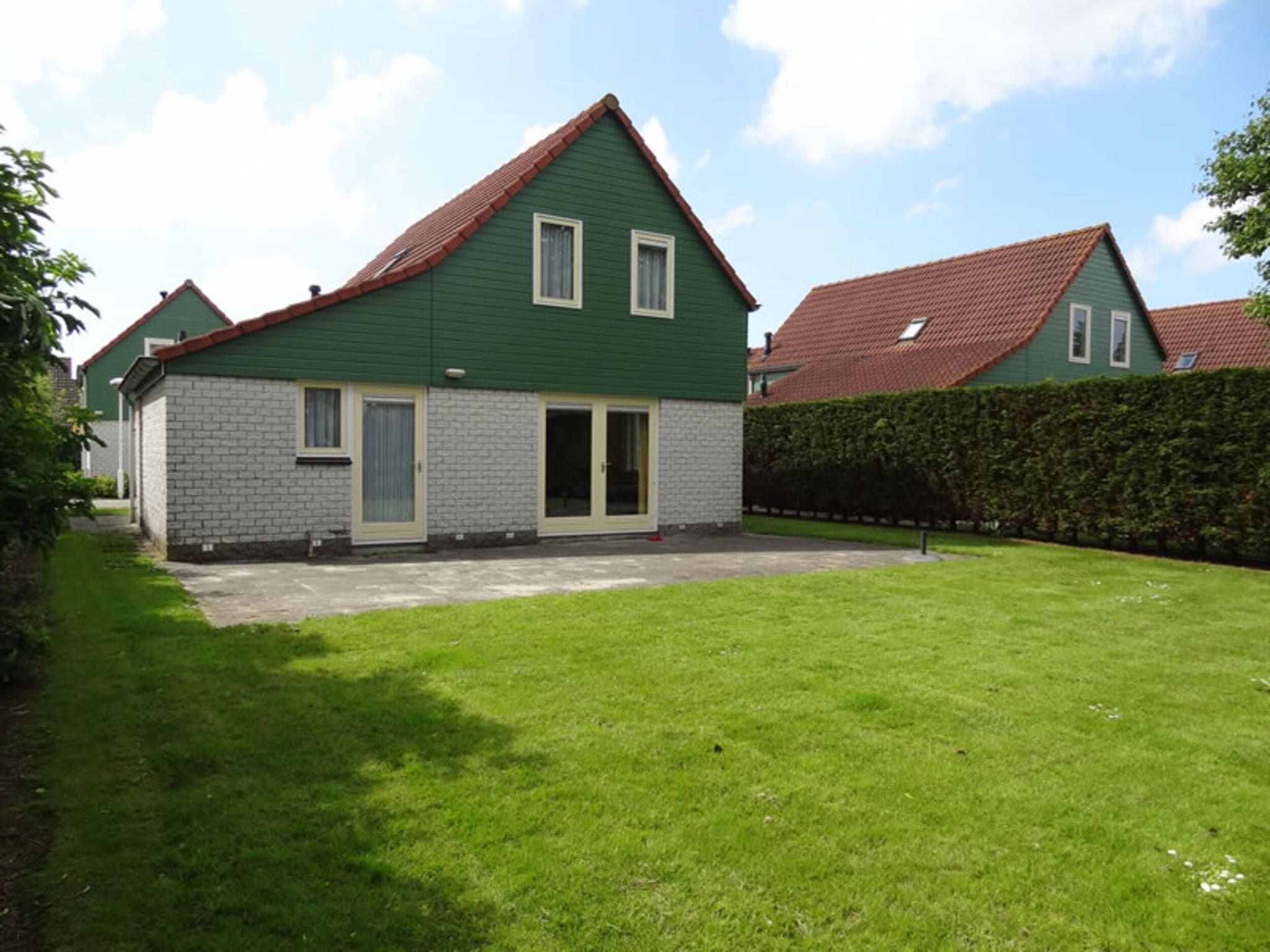 De buitenkant van Villapark De Oesterbaai 64 in Wemeldinge