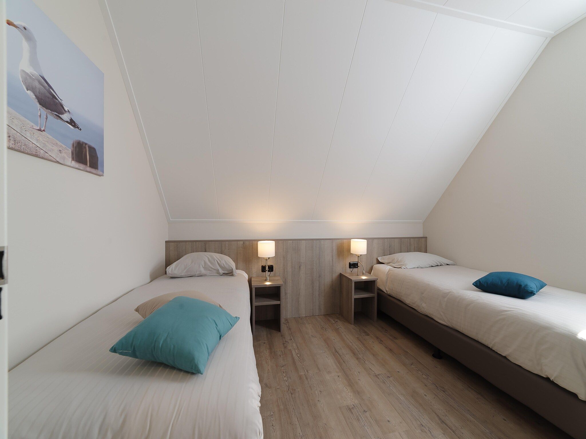 Een slaapkamer van Game Villa in Colijnsplaat