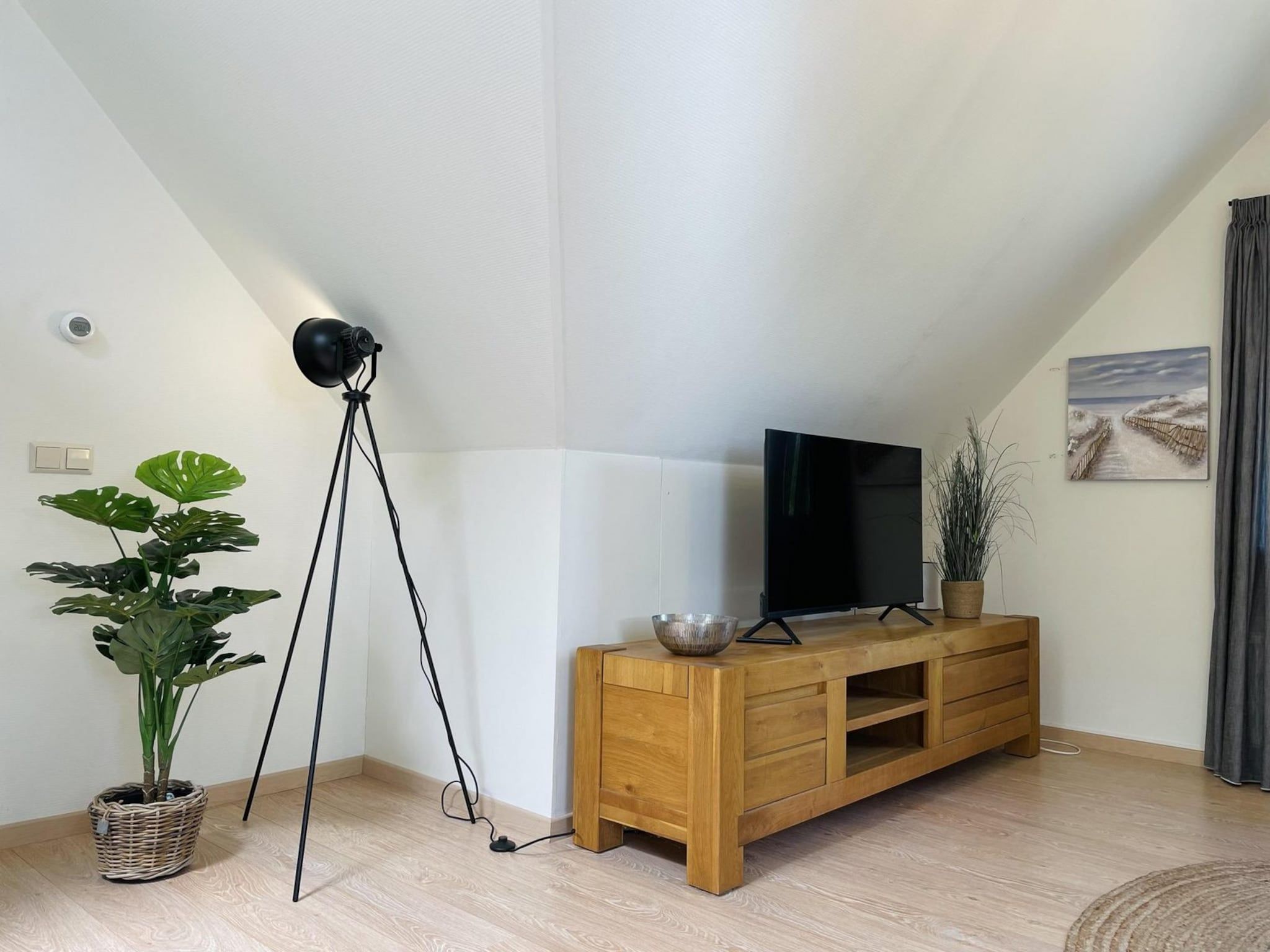 De woonkamer van Anzelhoef Apartment Oost in Sint Maartenszee