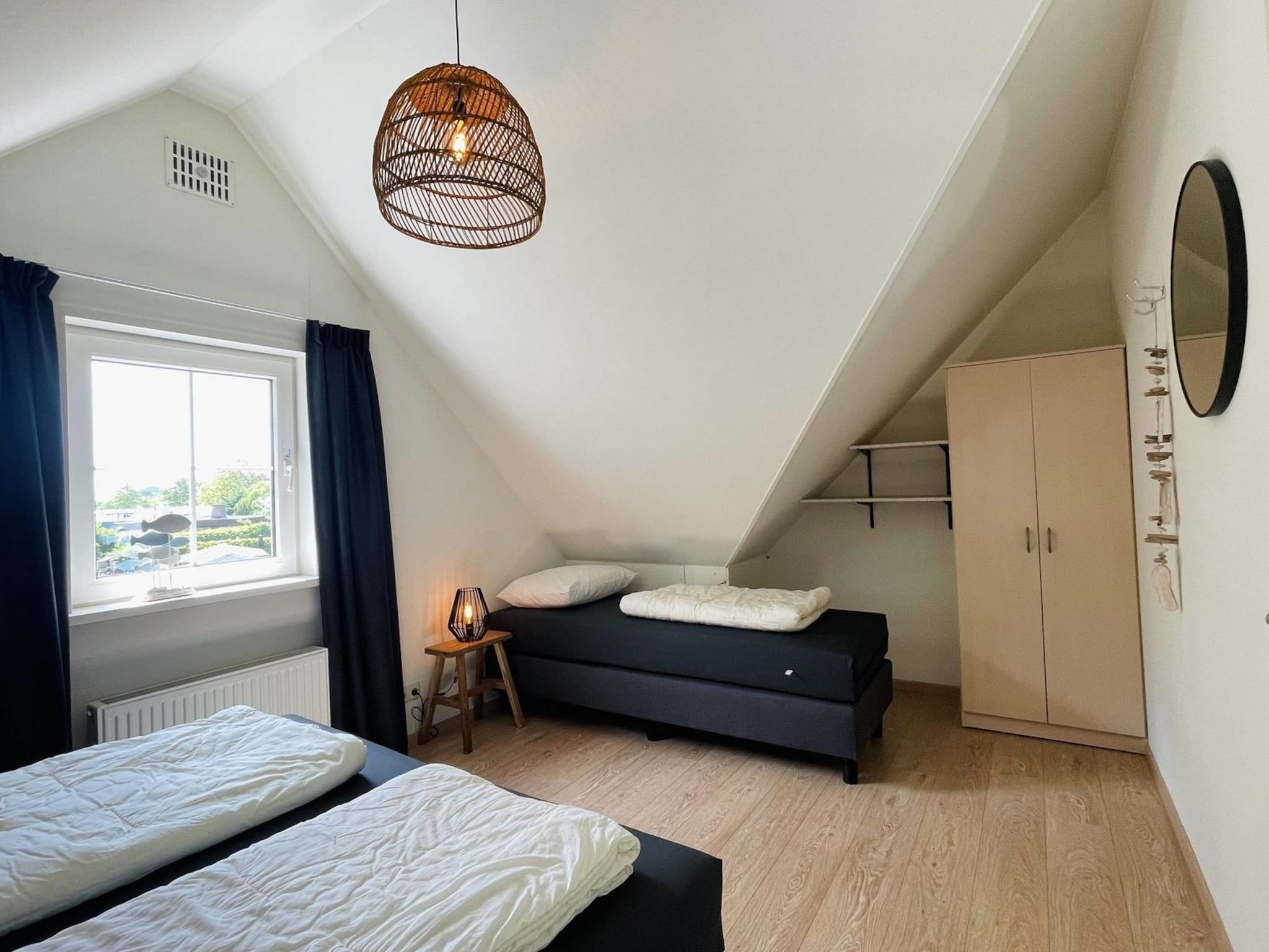 Een slaapkamer van Anzelhoef Apartment Oost in Sint Maartenszee