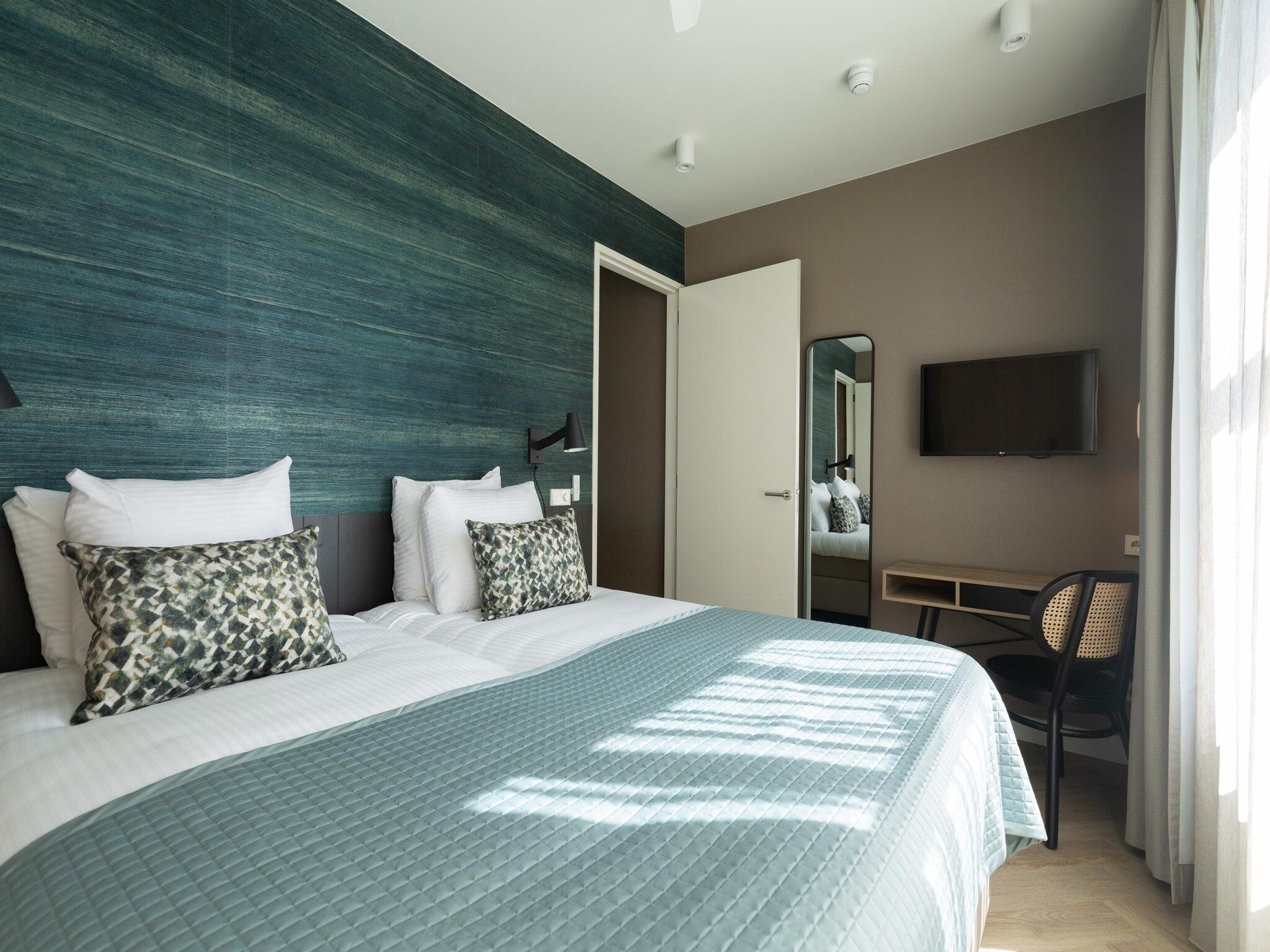 Een slaapkamer van Maurits 4 in Den Haag