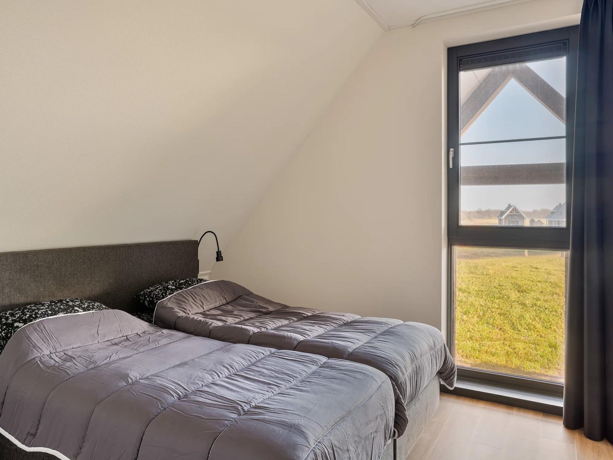 Een slaapkamer van Patrijs Wellness Plus 8 in Noardburgum