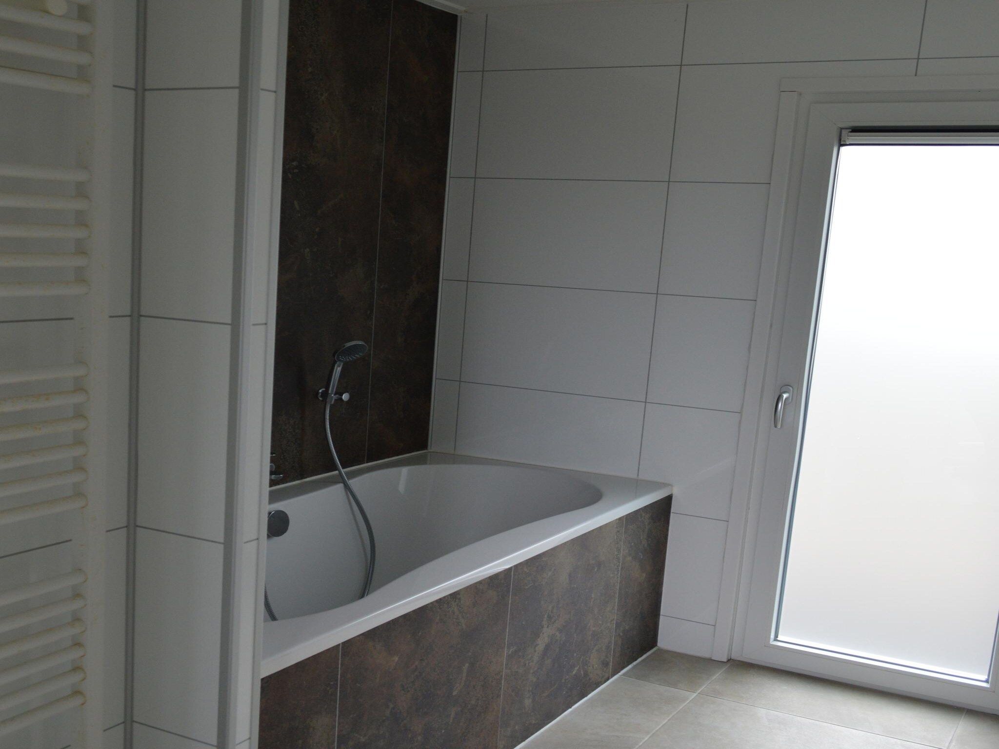 De badkamer van Ravenbosch Royal - Bath & Atmospheric fireplace in Bemelen
