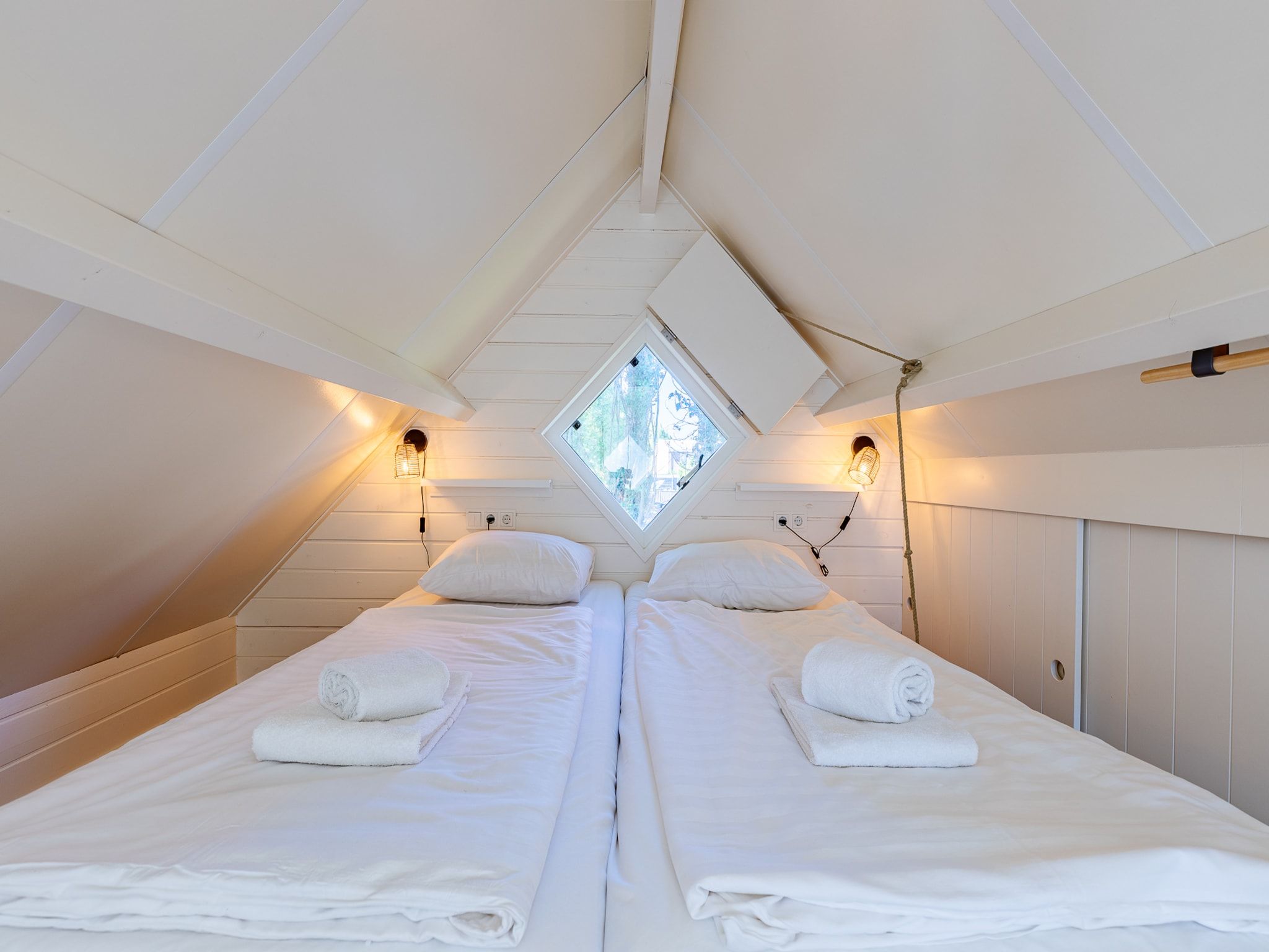 Een slaapkamer van Lijsterhofstraat 13 - Knusse vakantiewoning nabij strand en centrum in Domburg