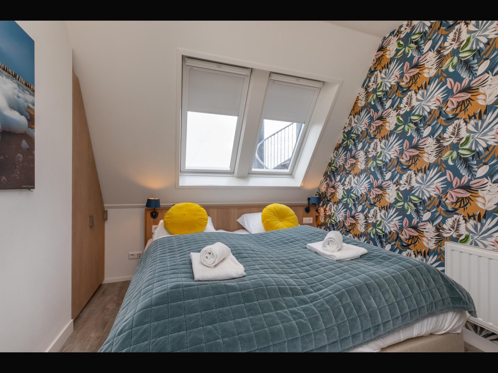 Een slaapkamer van Vakantiehuisje Langstraat 29B Zoutelande 4 Personen  Comfortabel Verblijf in Zoutelande