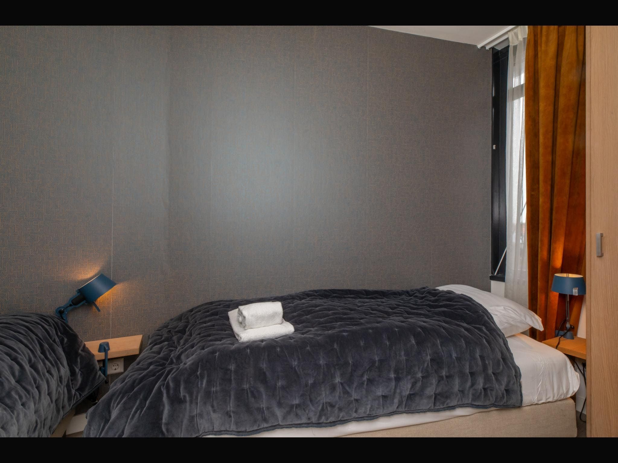 Een slaapkamer van Vakantiehuisje Langstraat 29B Zoutelande 4 Personen  Comfortabel Verblijf in Zoutelande