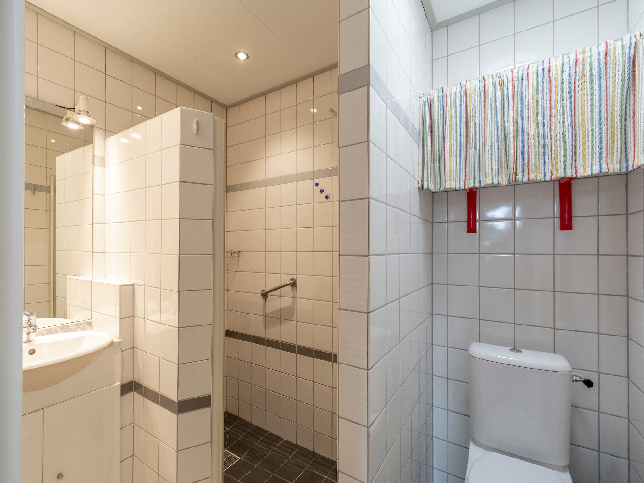 De badkamer van Watersnip 57 "Huis Skuumkoppe" in Petten