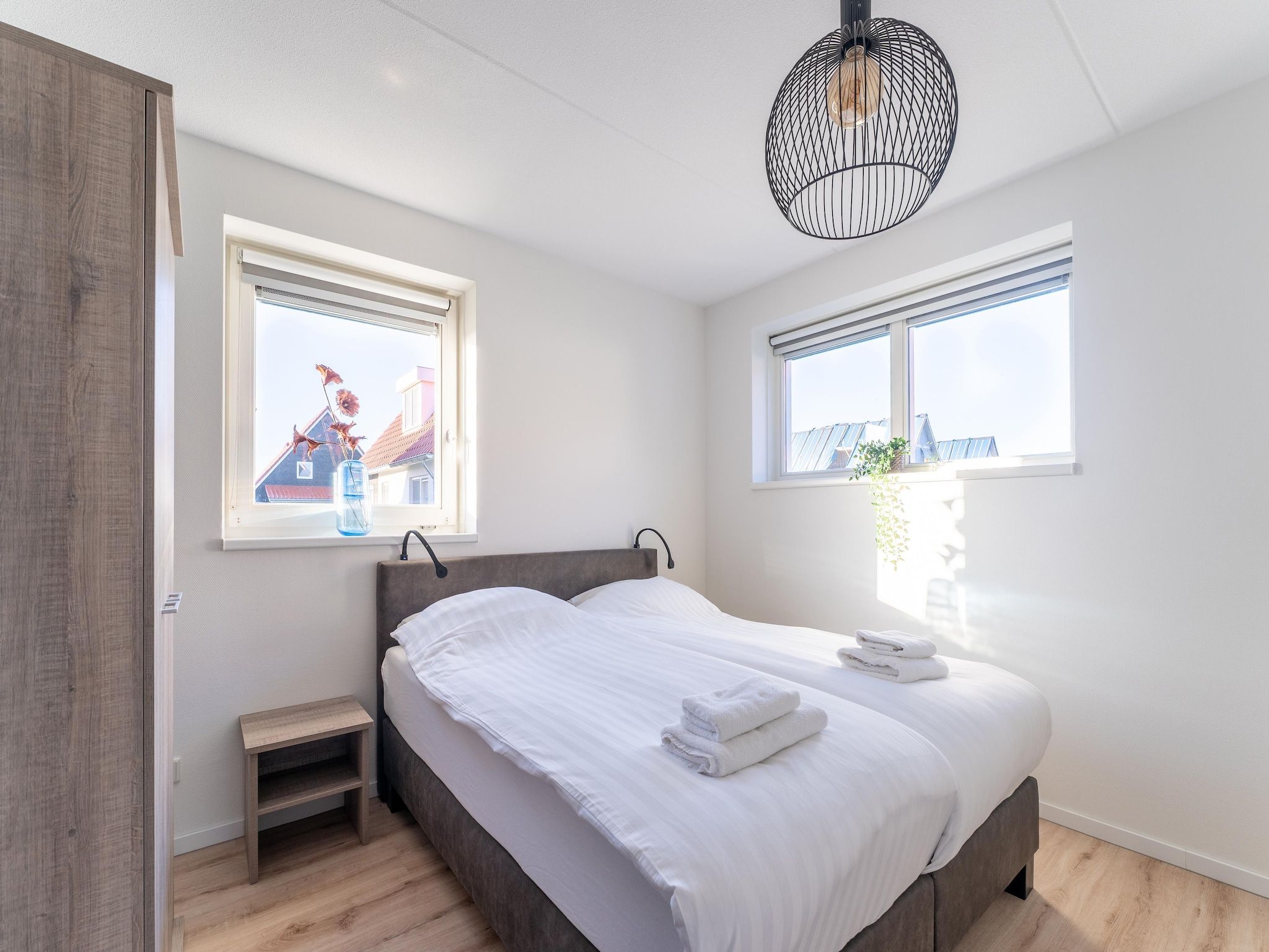 Een slaapkamer van Wulpdal 63 in Scherpenisse