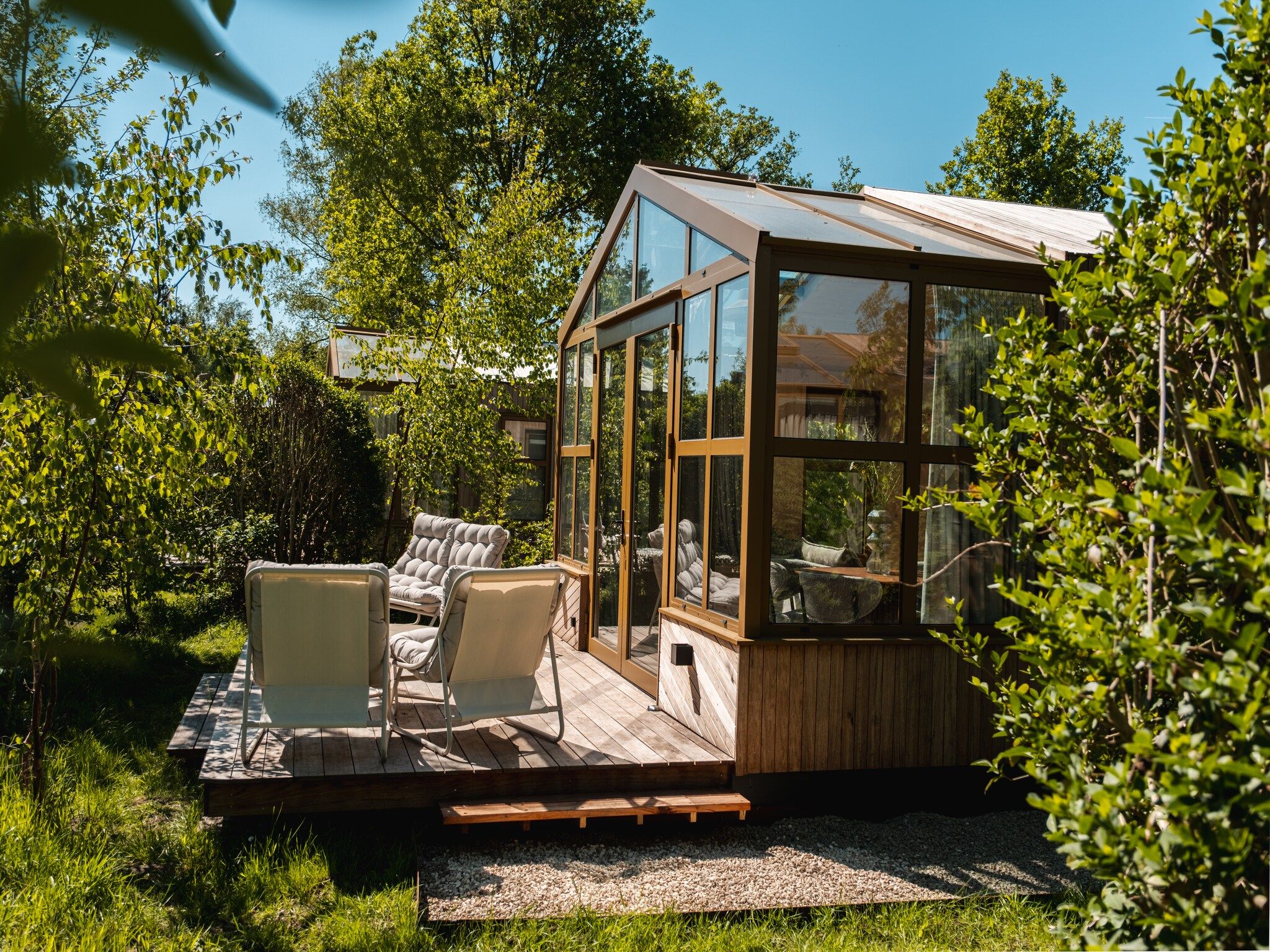 De tuin van Large Green House 4 persoons in Scherpenzeel (FR)