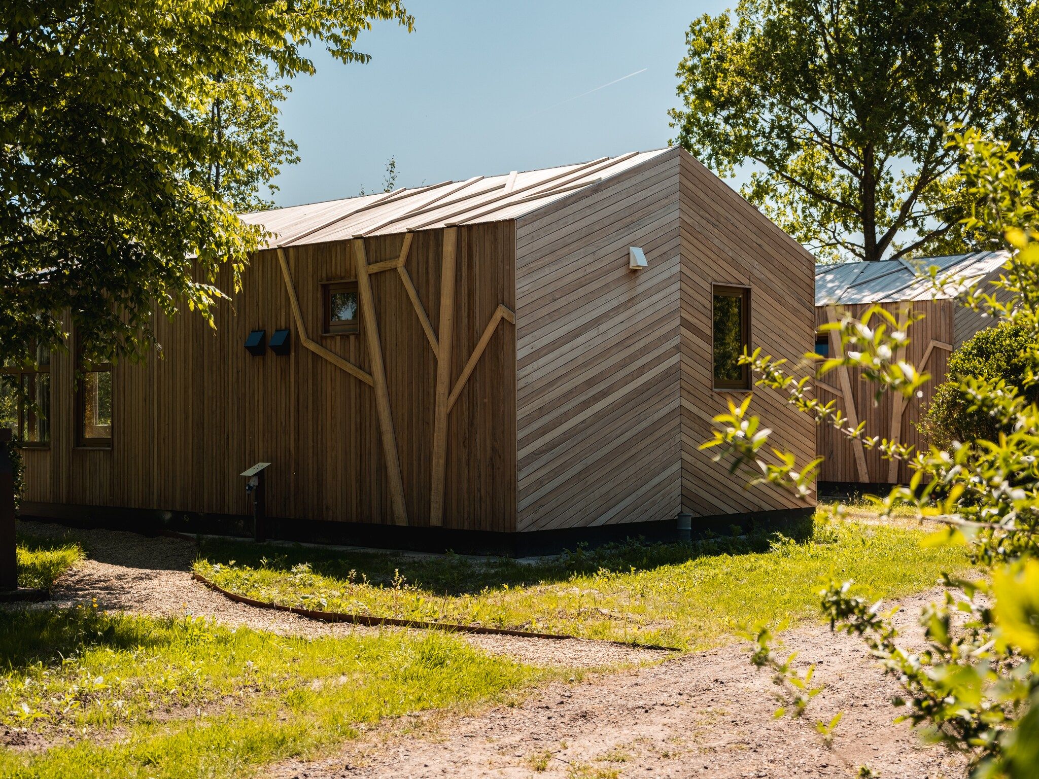 De buitenkant van Large Green House 4 persoons in Scherpenzeel (FR)