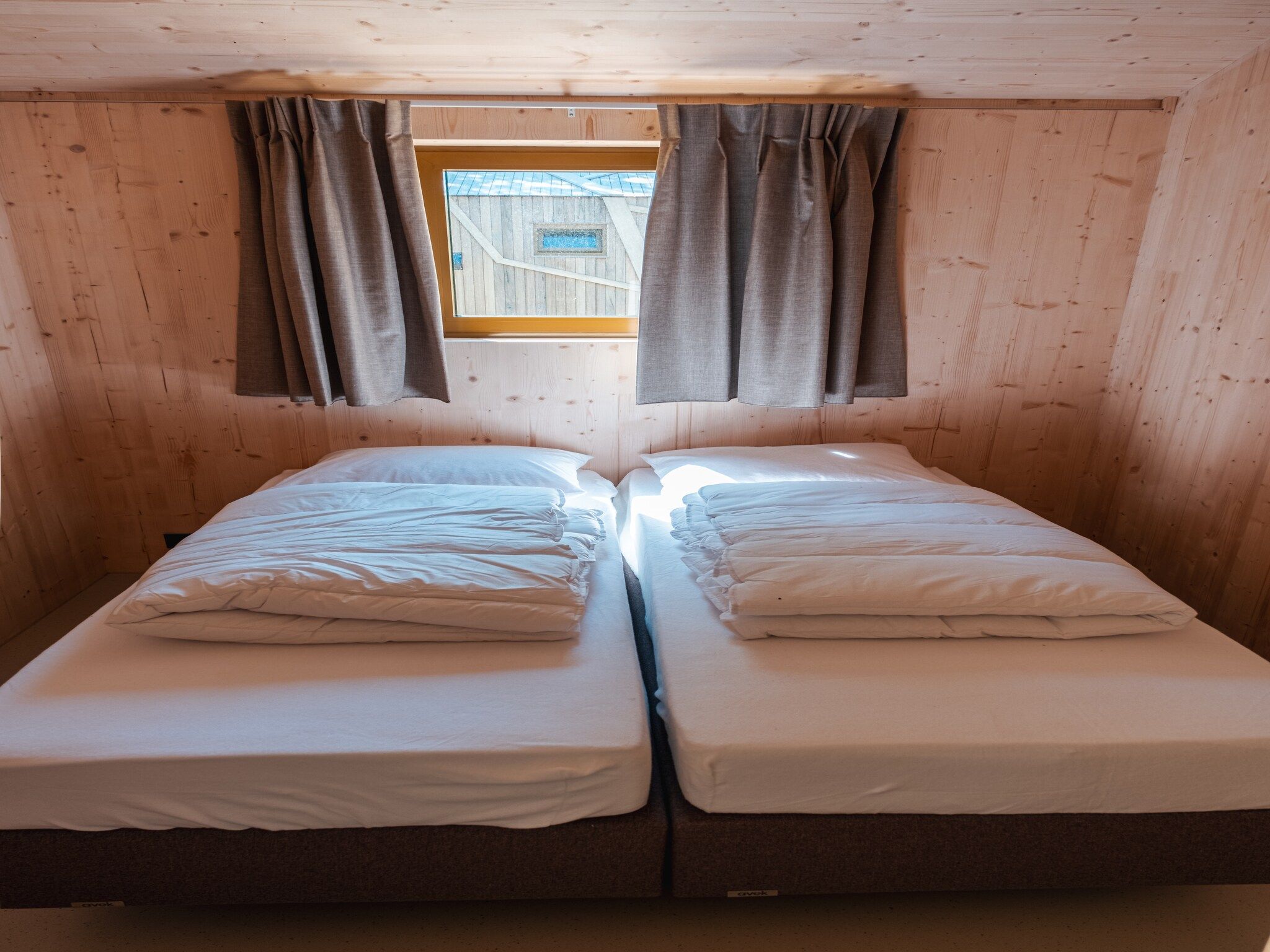 Een slaapkamer van Large Green House 4 persoons in Scherpenzeel (FR)