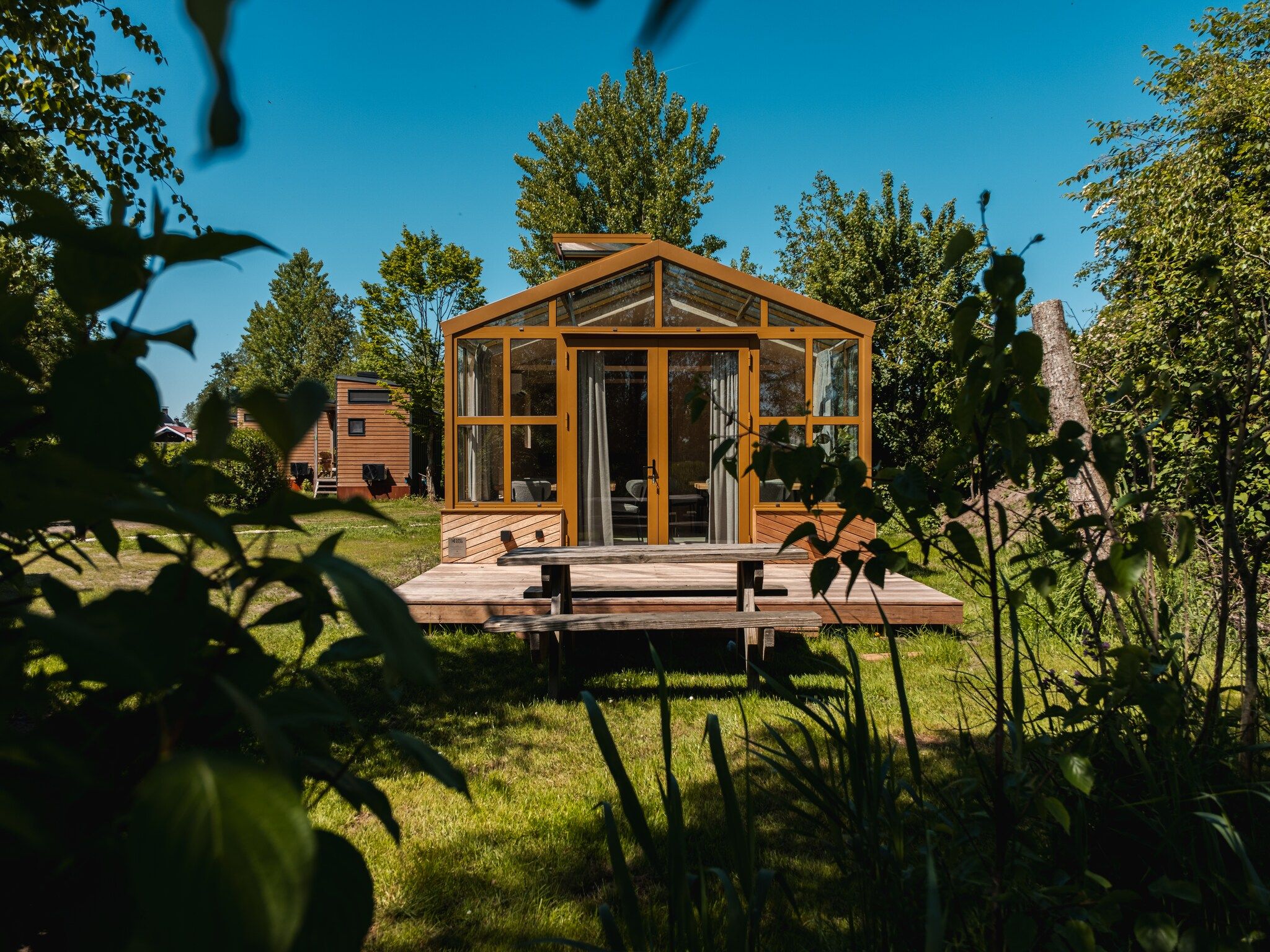 De buitenkant van Large Green House 4 persoons in Scherpenzeel (FR)