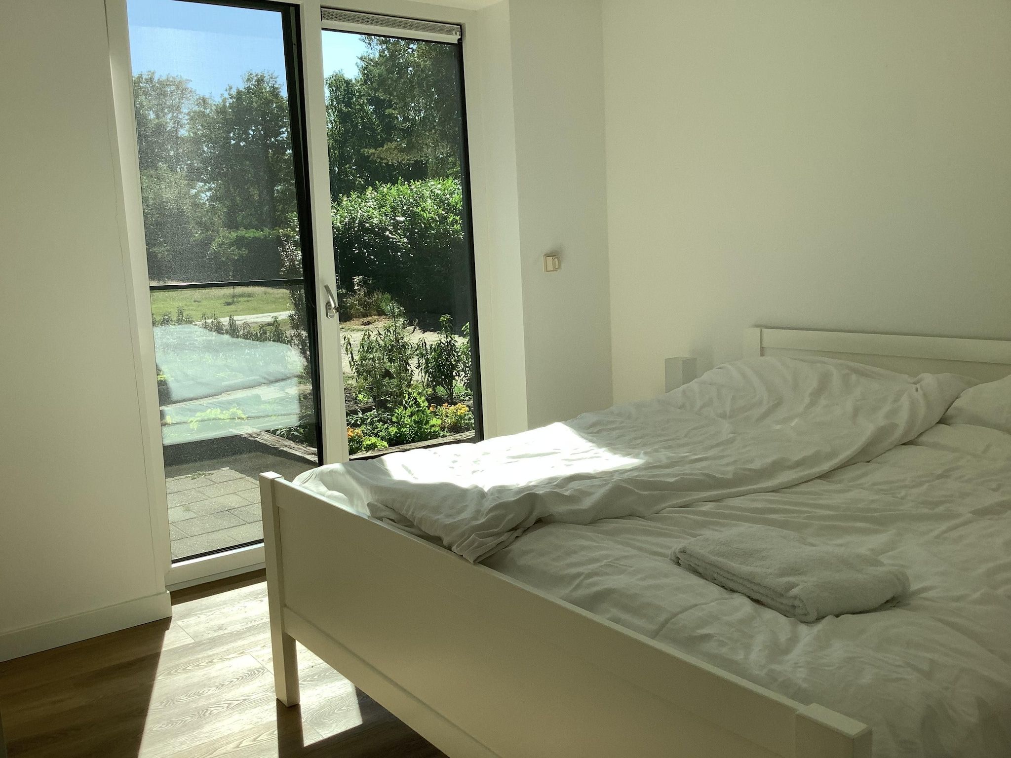 Een slaapkamer van Ermerzand Retreat in Erm