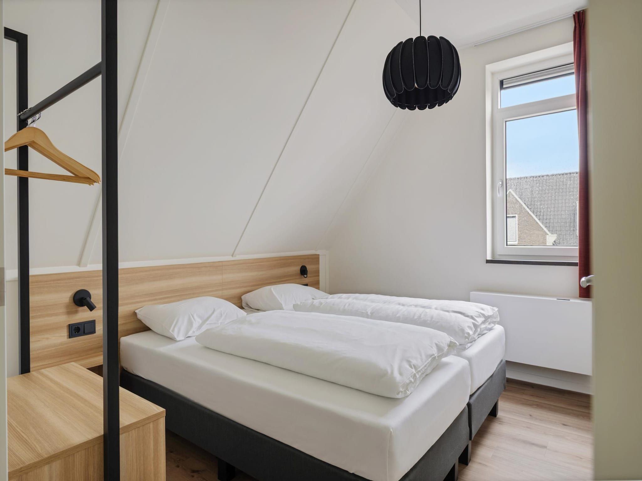 Een slaapkamer van Dijkhuys in PS Opperdoes