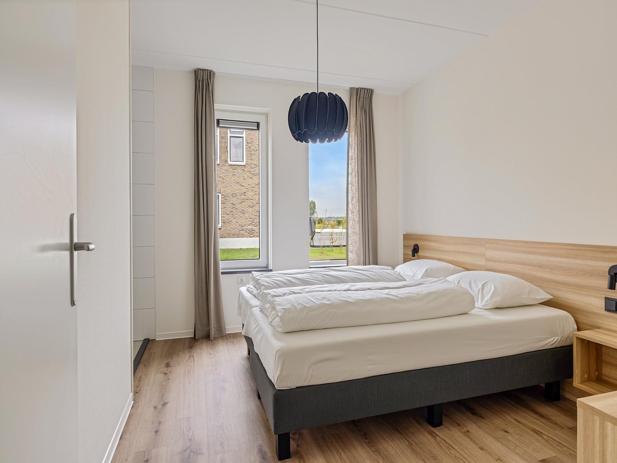 Een slaapkamer van Kleine Vliet in PS Opperdoes