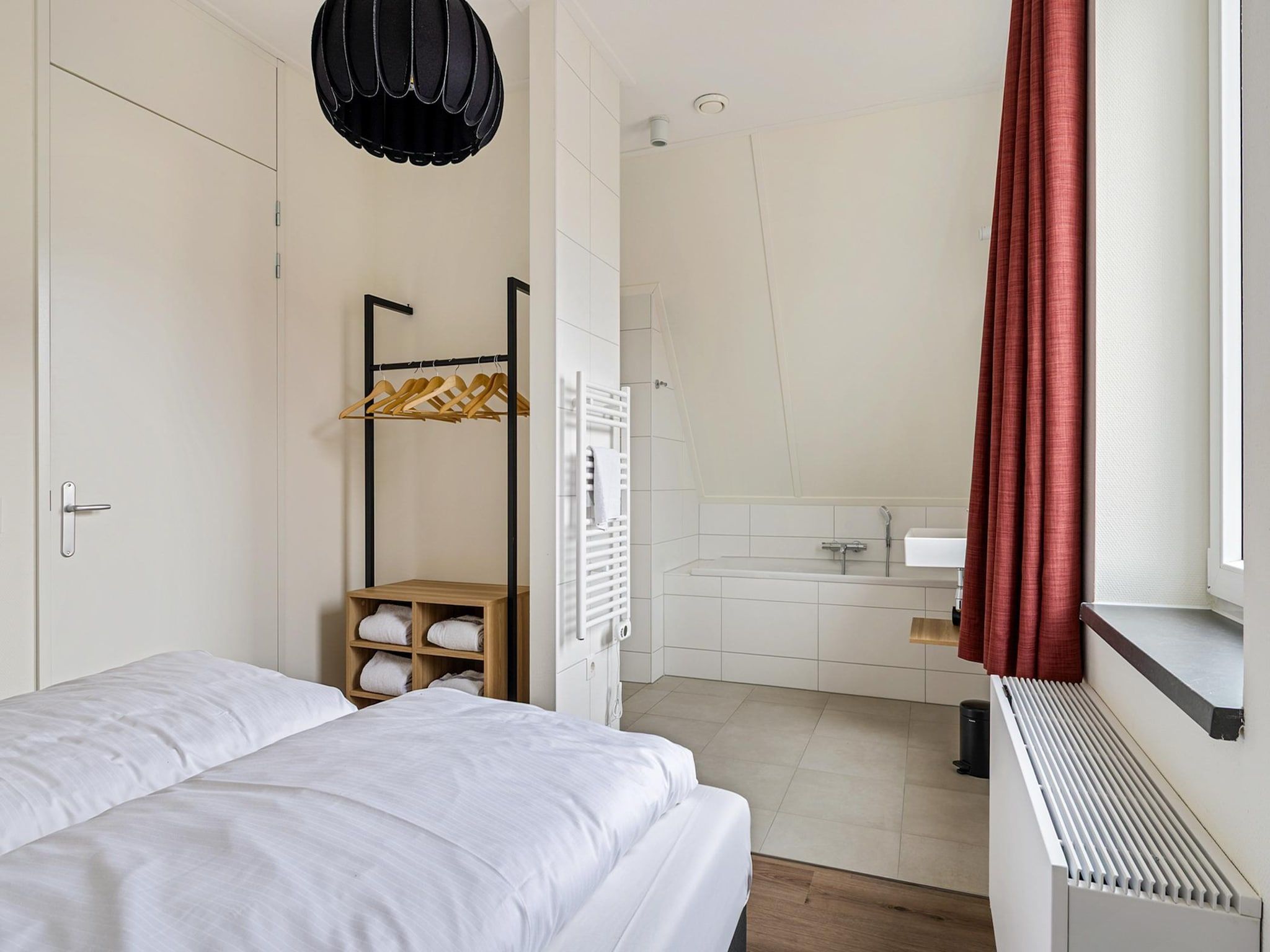 Een slaapkamer van Korenhuys in PS Opperdoes