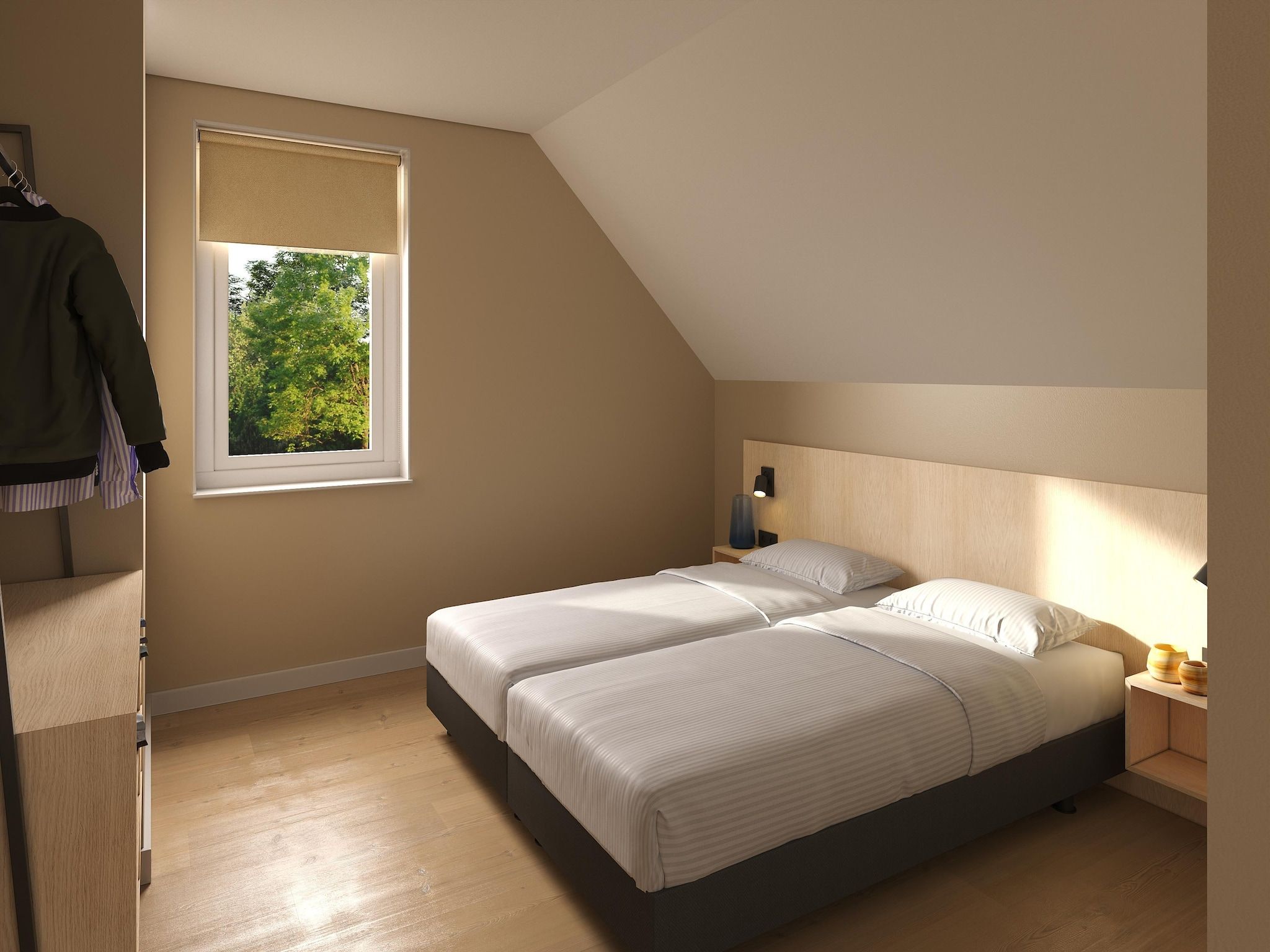 Een slaapkamer van Vooroeverhuys Wellness in PS Opperdoes