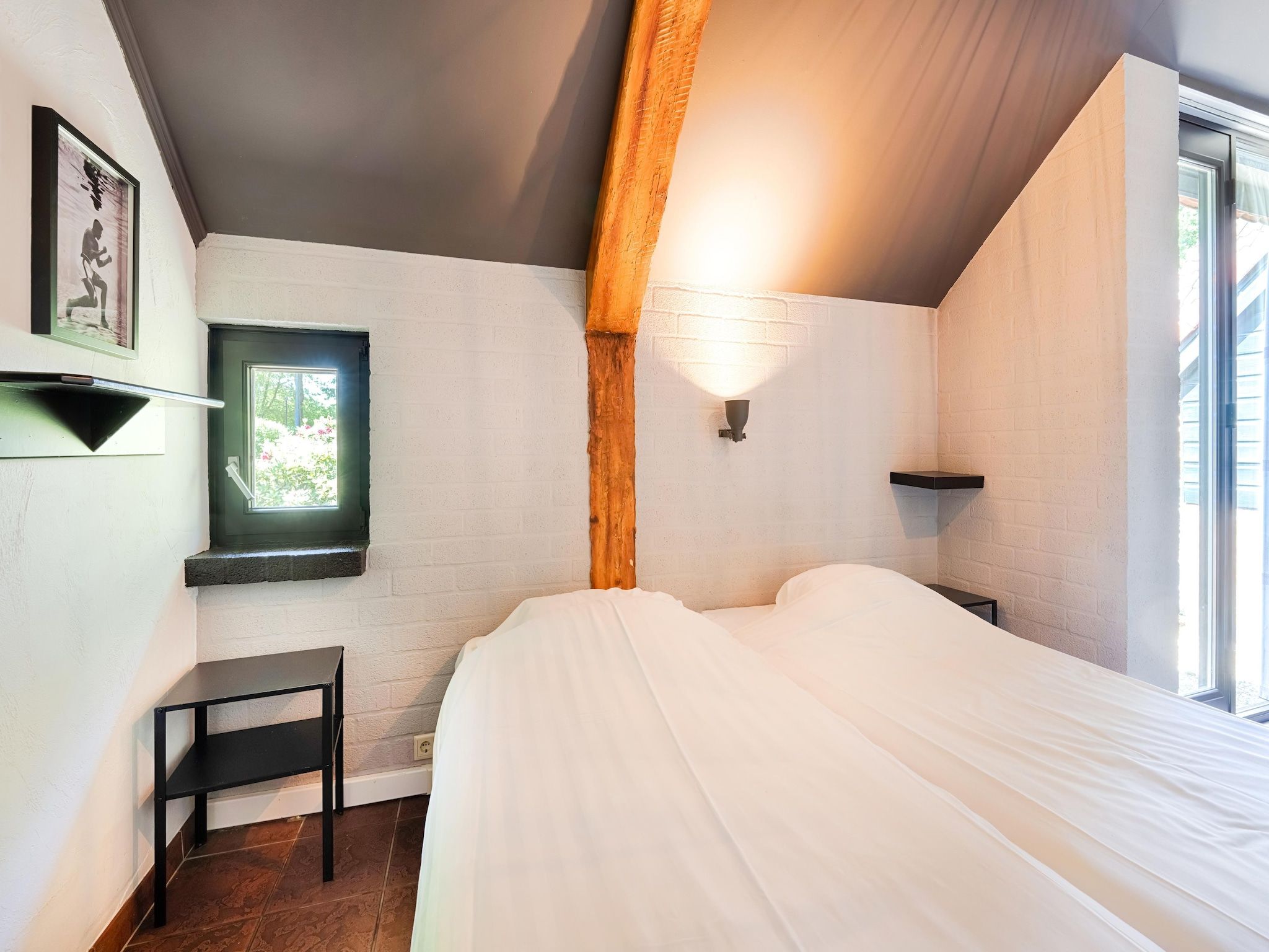 Een slaapkamer van 't Woold in Asten