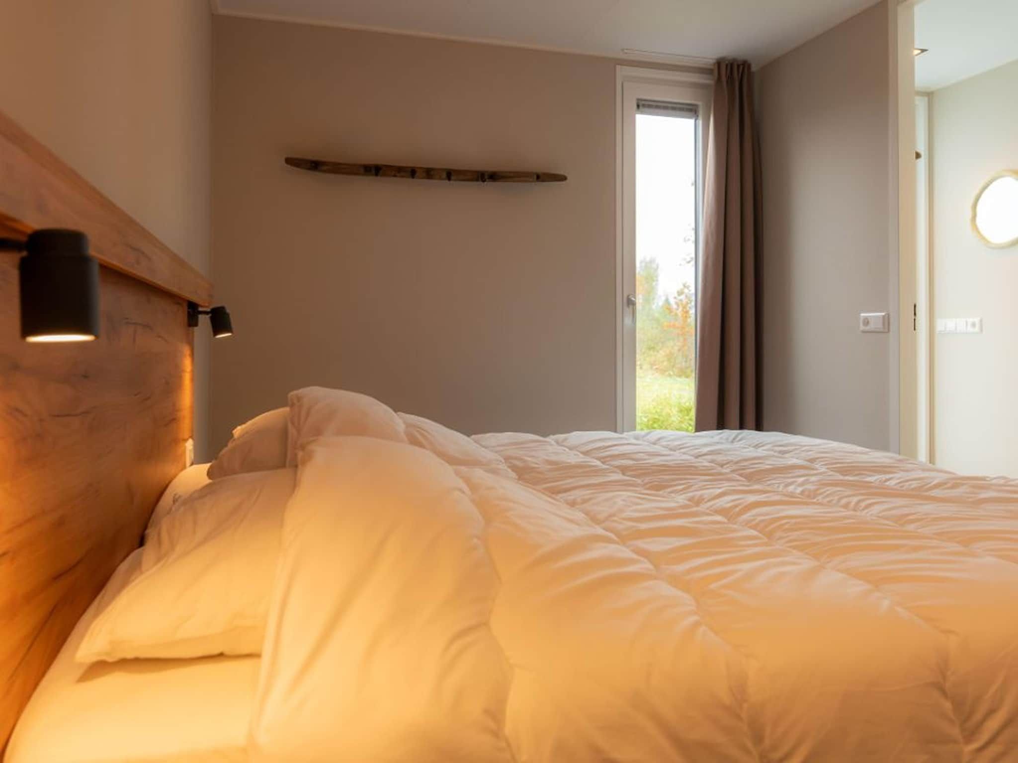 Een slaapkamer van Op'e Pleats in Sint Nicolaasga