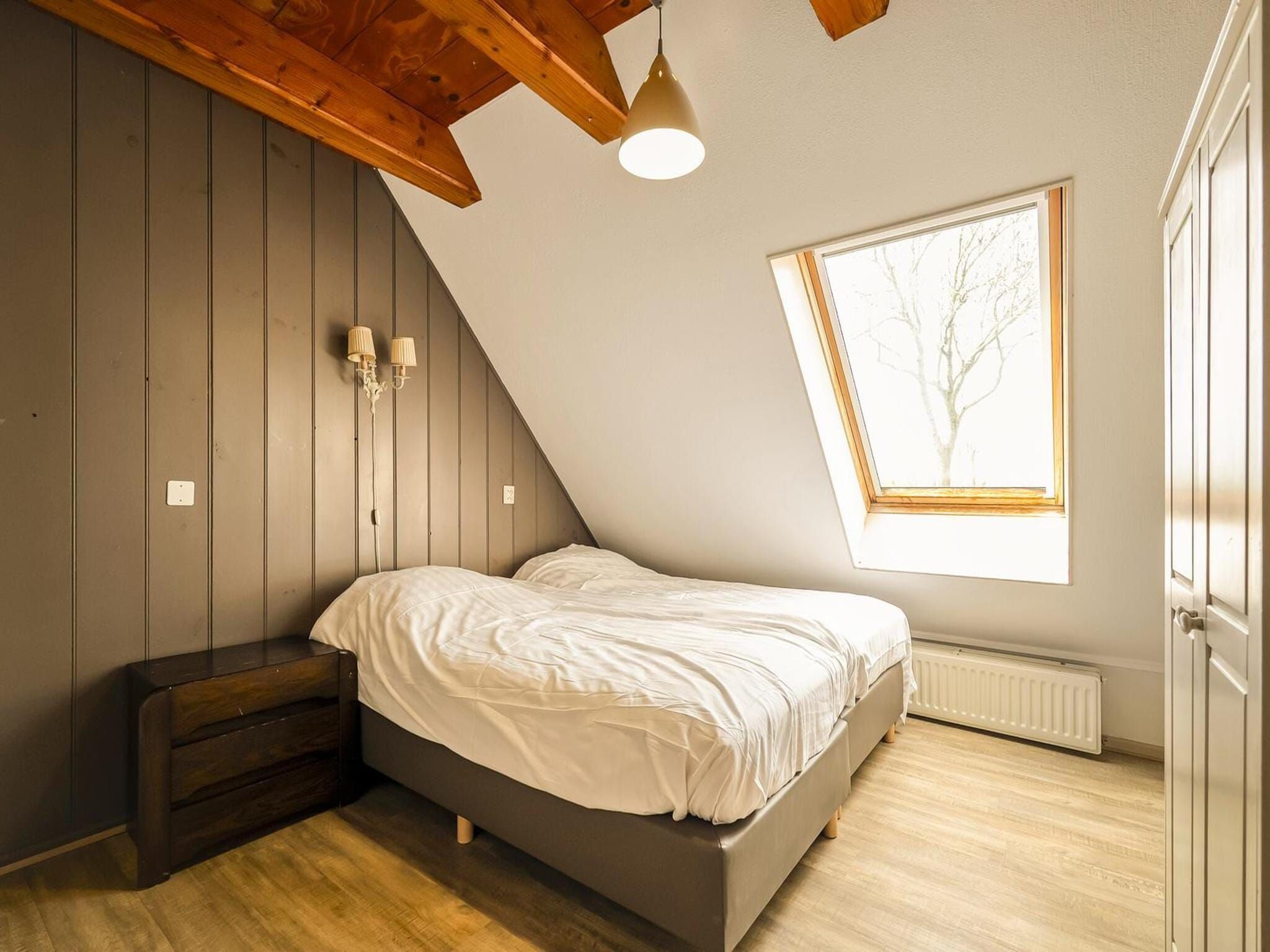 Een slaapkamer van Appartement Boerderij in Schagen