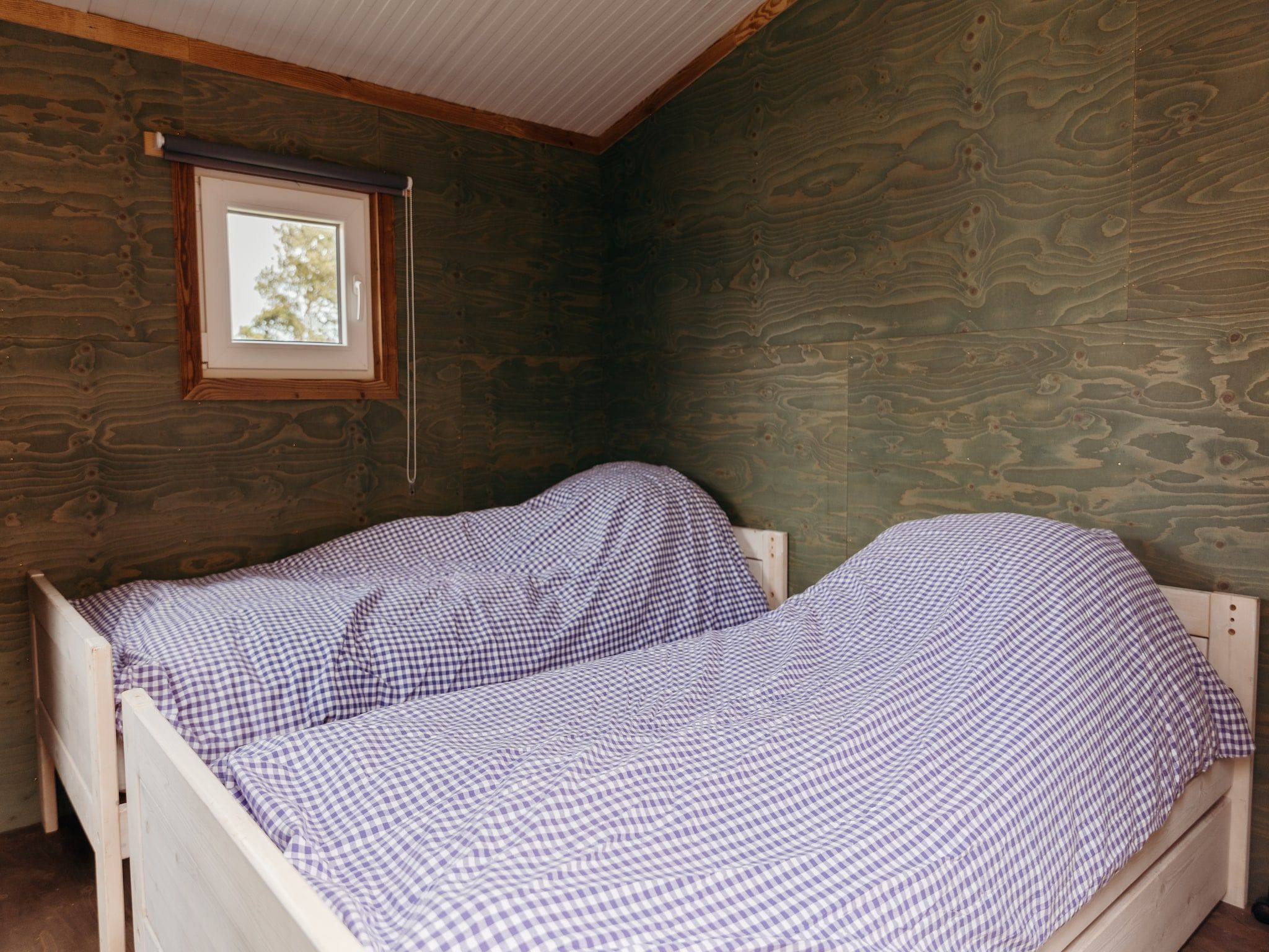 Een slaapkamer van Solglimt 4 Pers. in Callantsoog