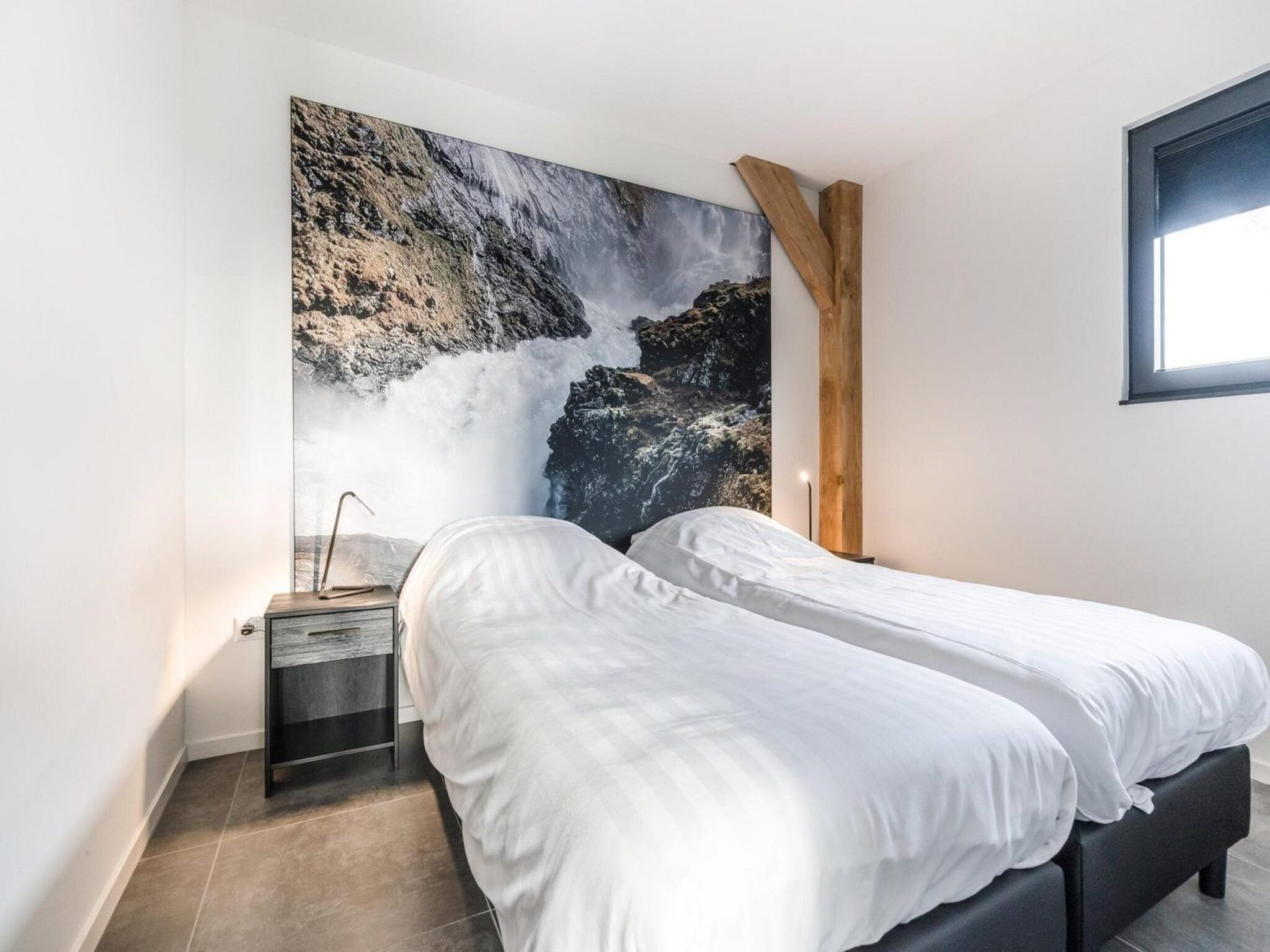 Een slaapkamer van Farm Lodge 677 in Baarle-nassau