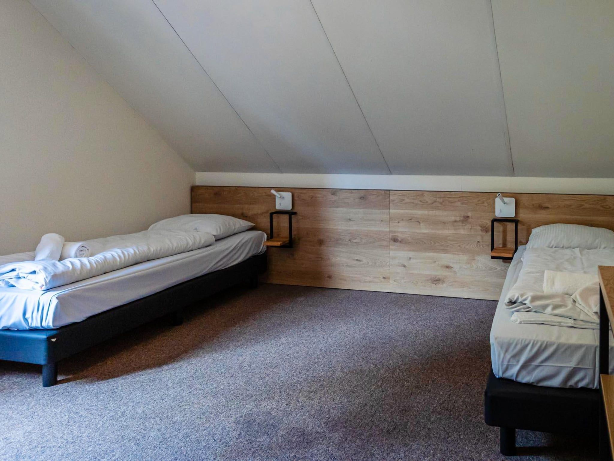 Een slaapkamer van 16 - Persons Family bungalow in Ewijk