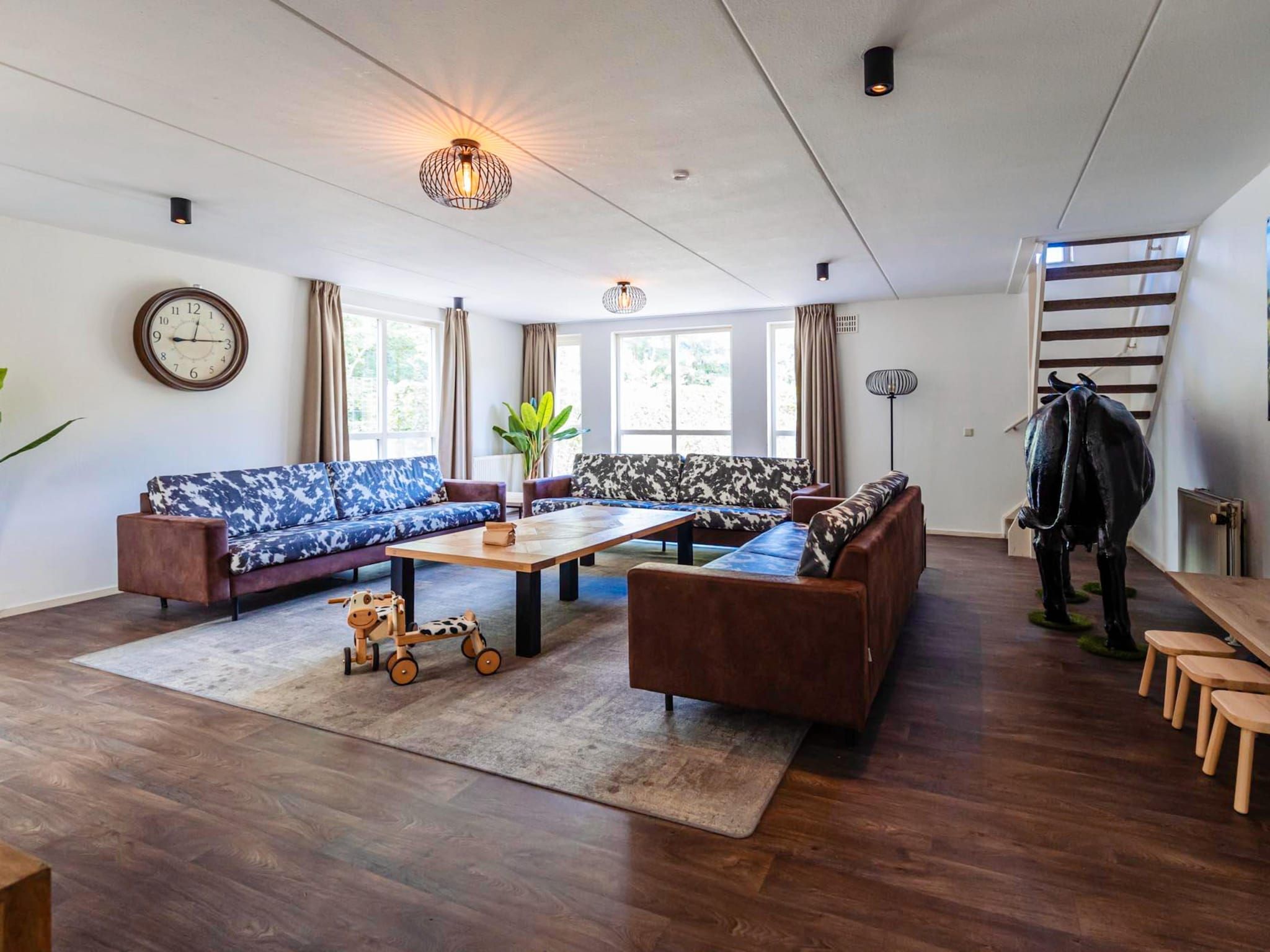 De woonkamer van 16 - Persons Family bungalow in Ewijk