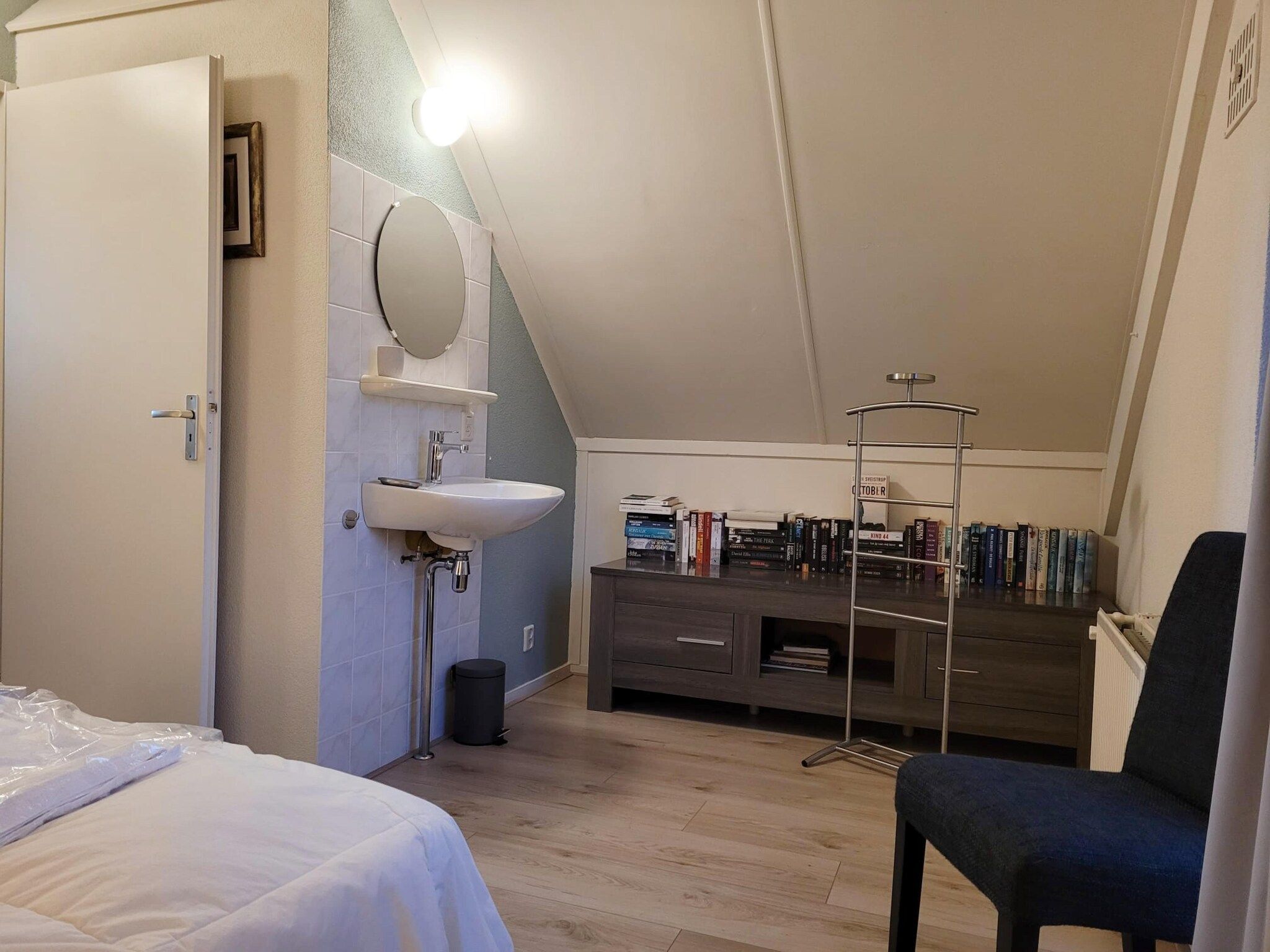 Een slaapkamer van 6 - Person Forest Pet & Family Bungalow in Ewijk