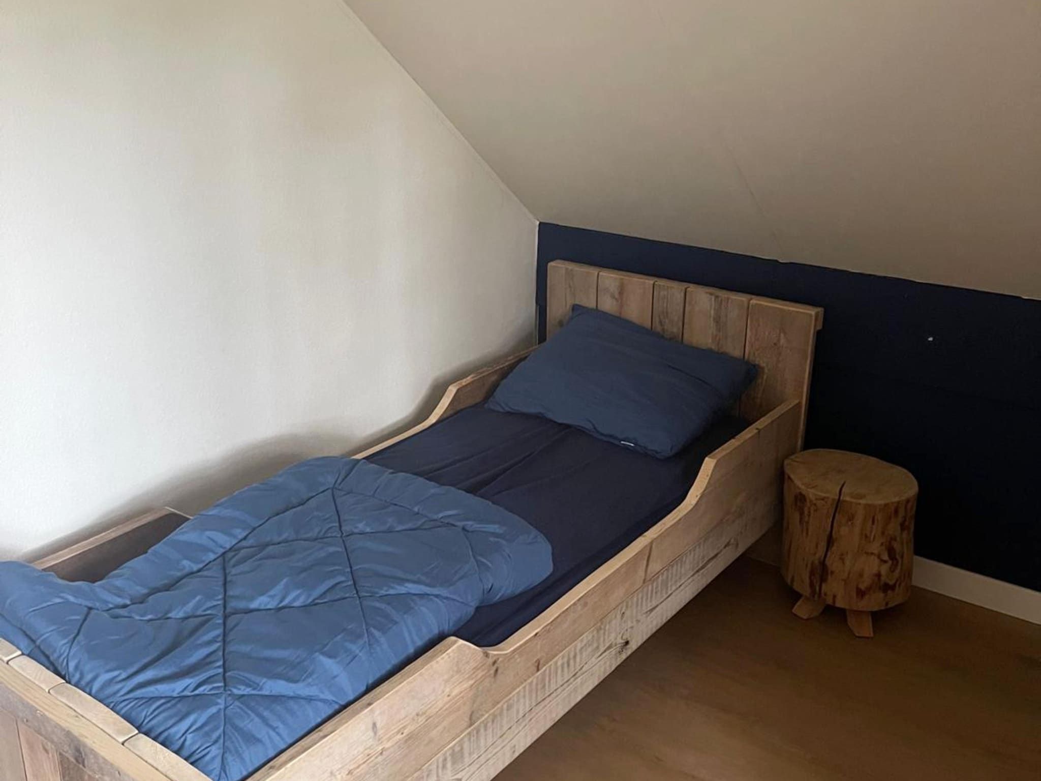Een slaapkamer van 6 - Persons Lakeside Bungalow (copy) in Ewijk