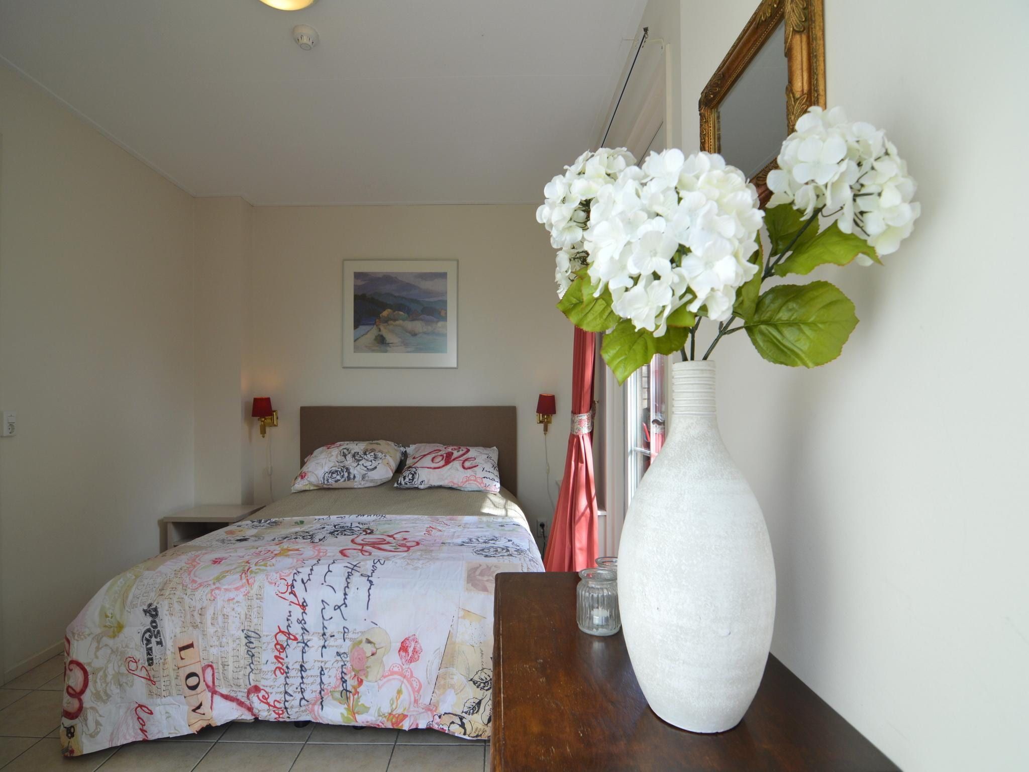 Een slaapkamer van BELLEVUE in Noordbeemster