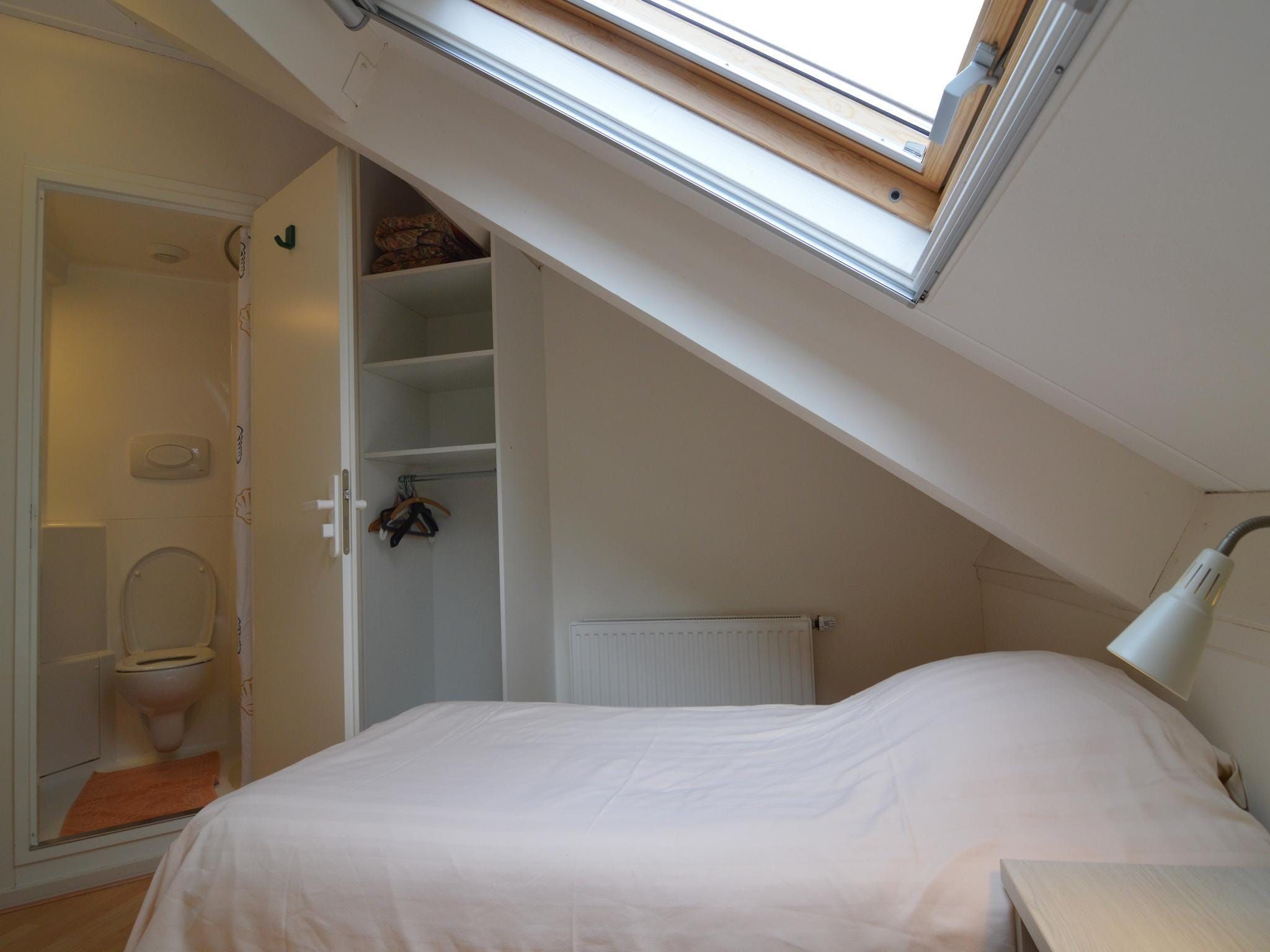 Een slaapkamer van BELLEVUE in Noordbeemster