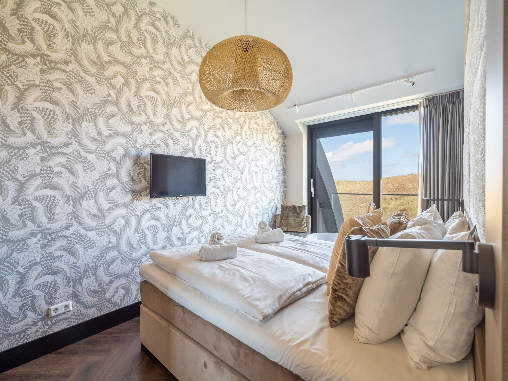 Een slaapkamer van Penthouse Zilt | 6 Persons in Sint Maartenszee