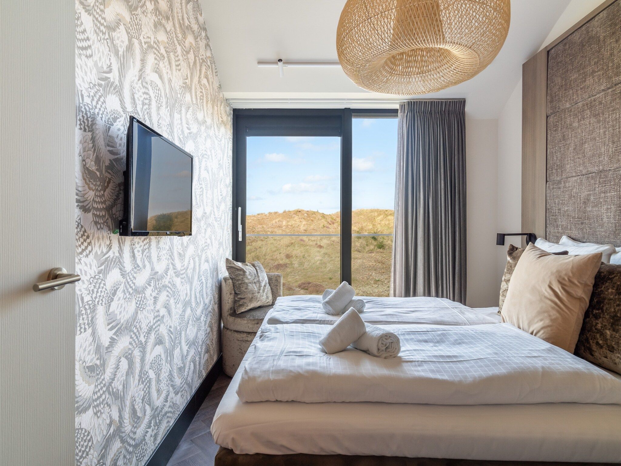 Een slaapkamer van Penthouse Zilt | 6 Persons in Sint Maartenszee